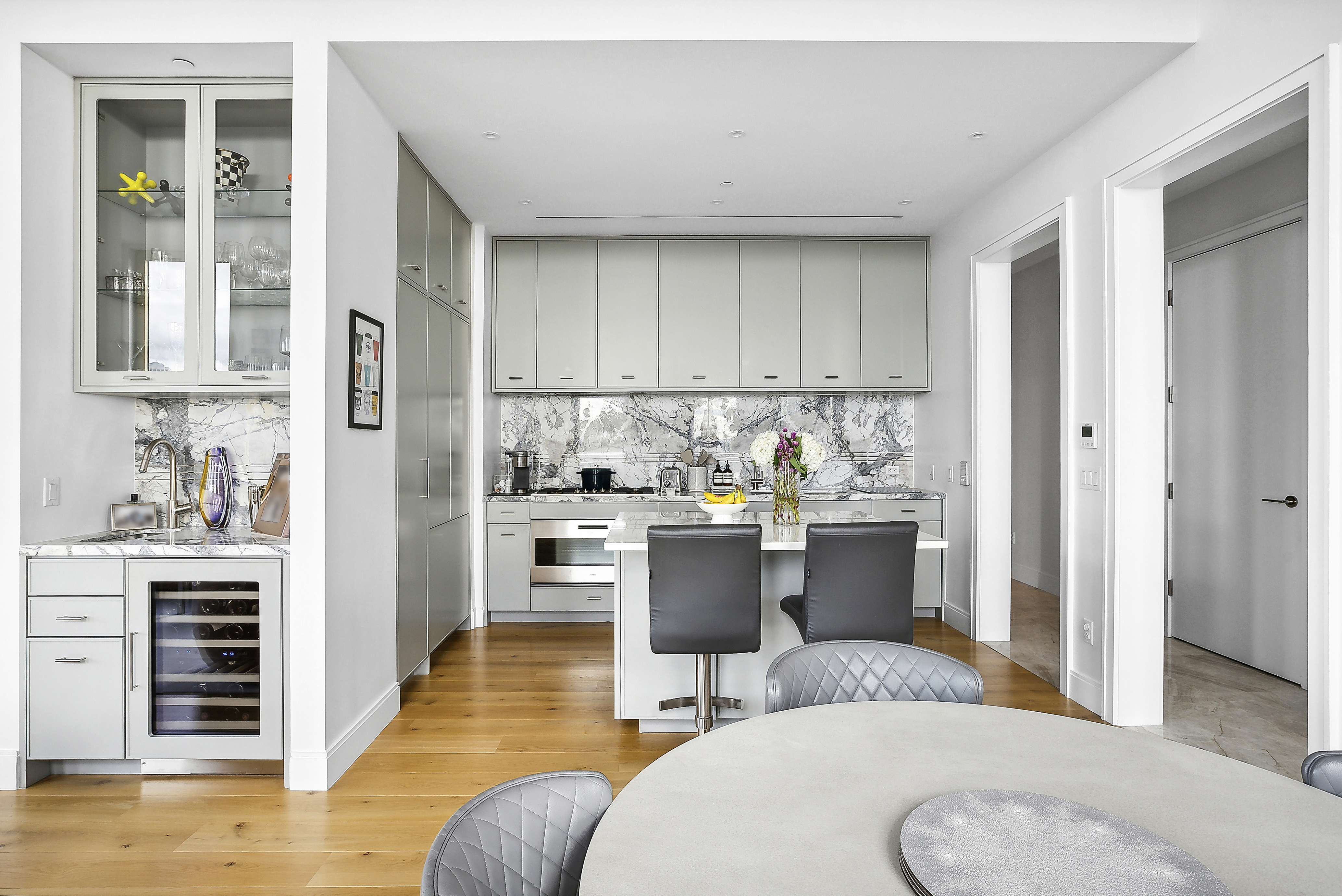 347 Henry Street, Unit 12A Brooklyn, NY 11201 - Photo 5 of 26 a kitchen with a refrigerator and a stove top oven