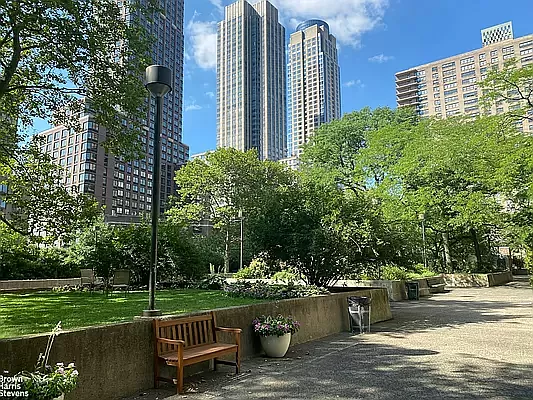 170 West End Avenue, Unit 15L Manhattan, NY 10023 - Photo 10 of 11 a view of a patio with chairs and a table