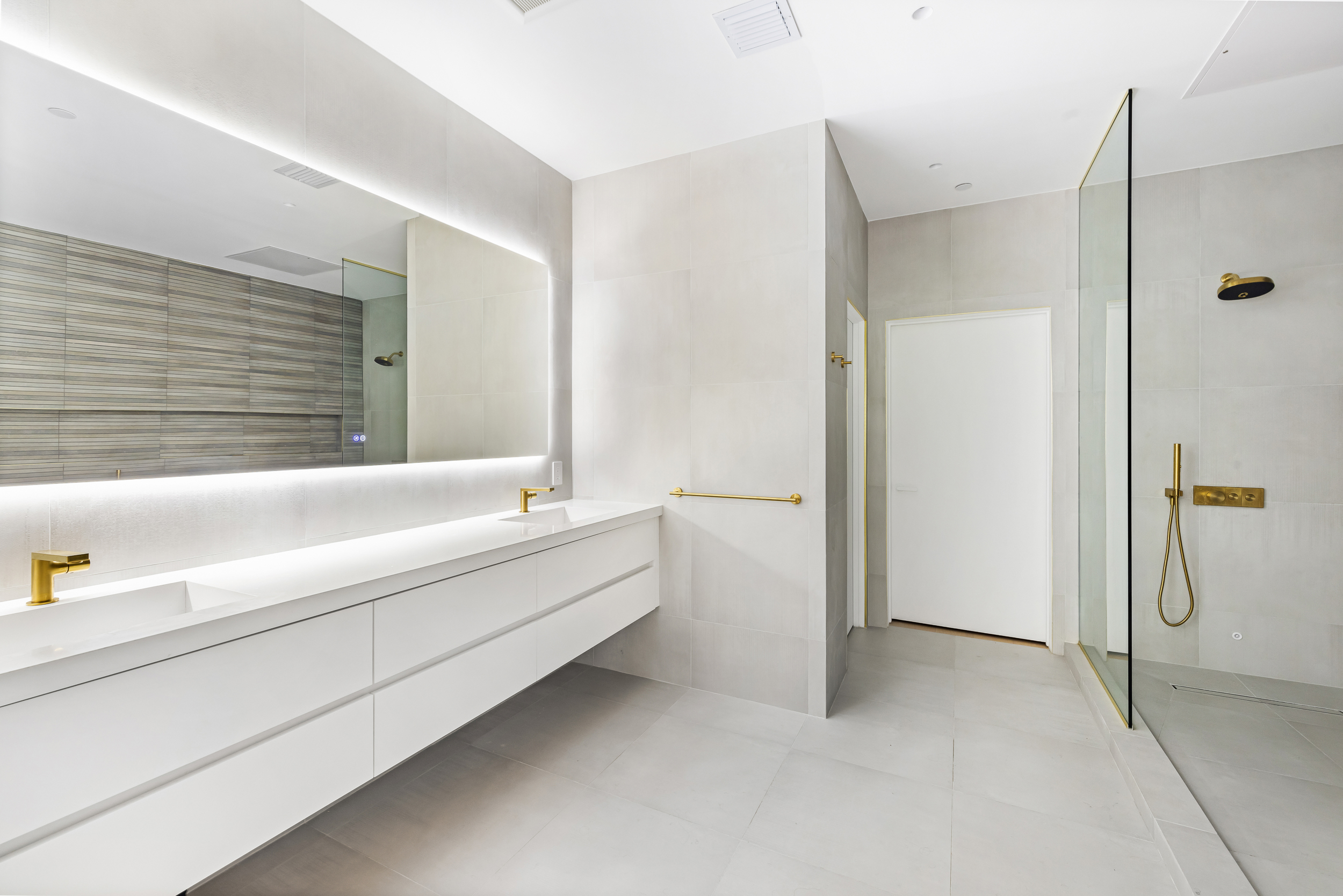 442 West 22nd Street Manhattan, NY 10011 - Photo 13 of 17 a bathroom with a bathtub and a shower