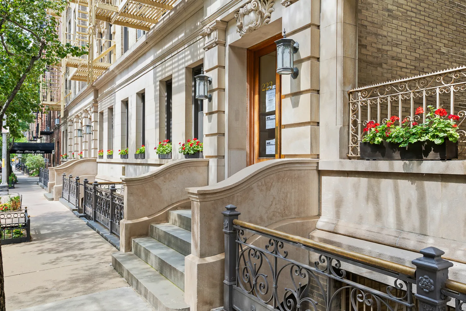 a view of balcony with small garden and wooden stairs