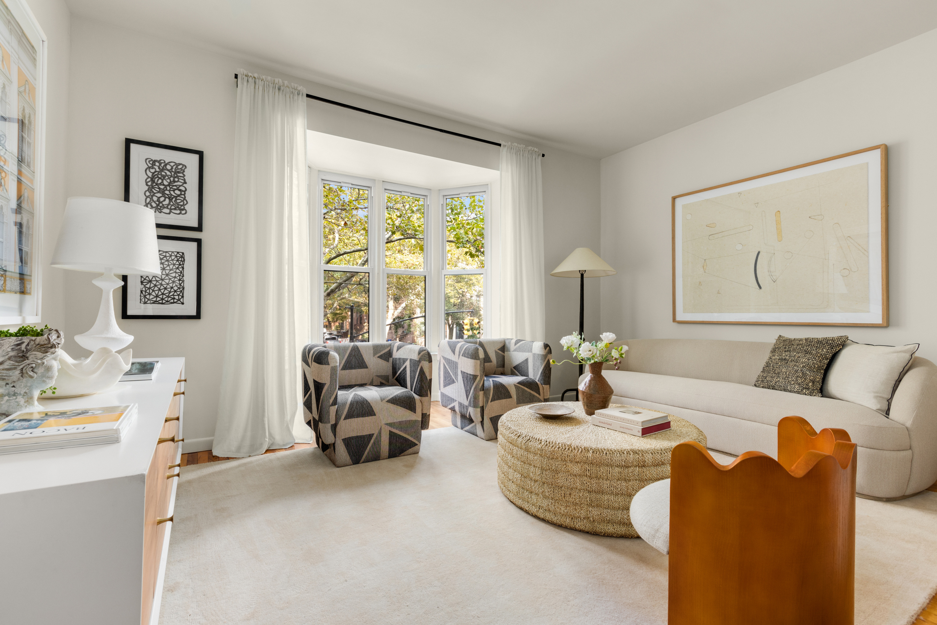 238 Clinton Street, Unit DE Brooklyn, NY 11201 - Photo 2 of 19 a living room with furniture and a large window