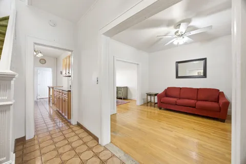 a living room with furniture and a table