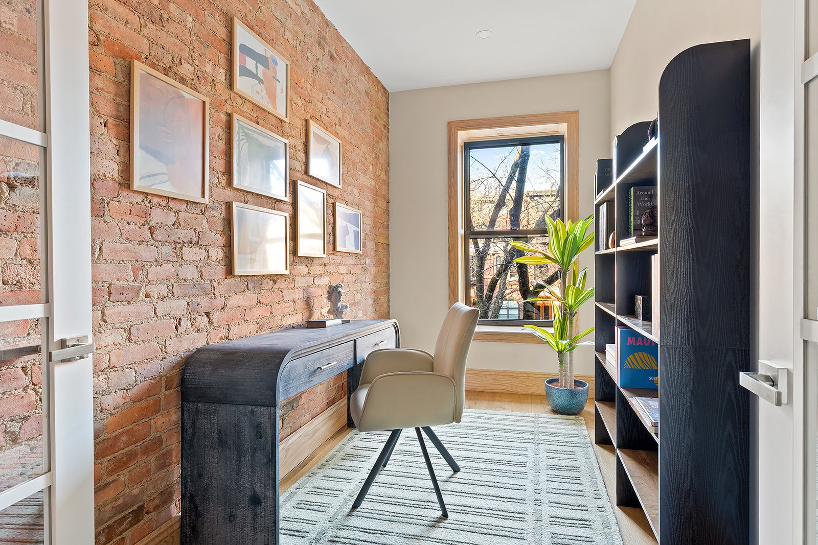 1220 Dean Street Brooklyn, NY 11216 - Photo 9 of 19 a living room with furniture and a wooden floor
