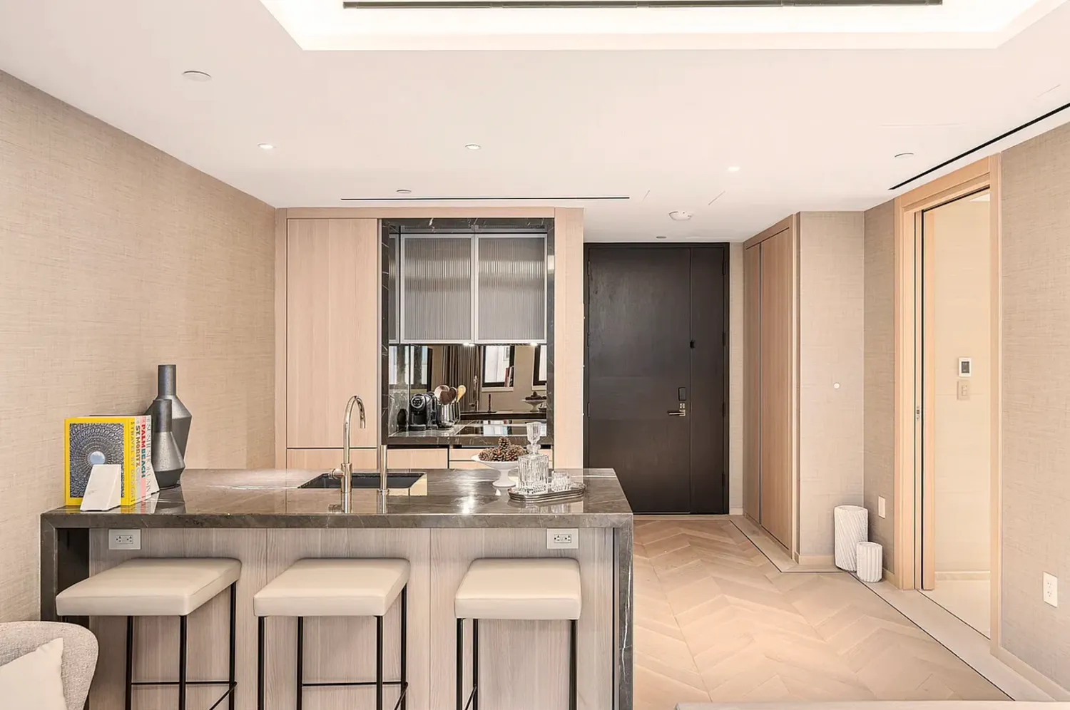 a kitchen with stainless steel appliances granite countertop a sink and cabinets