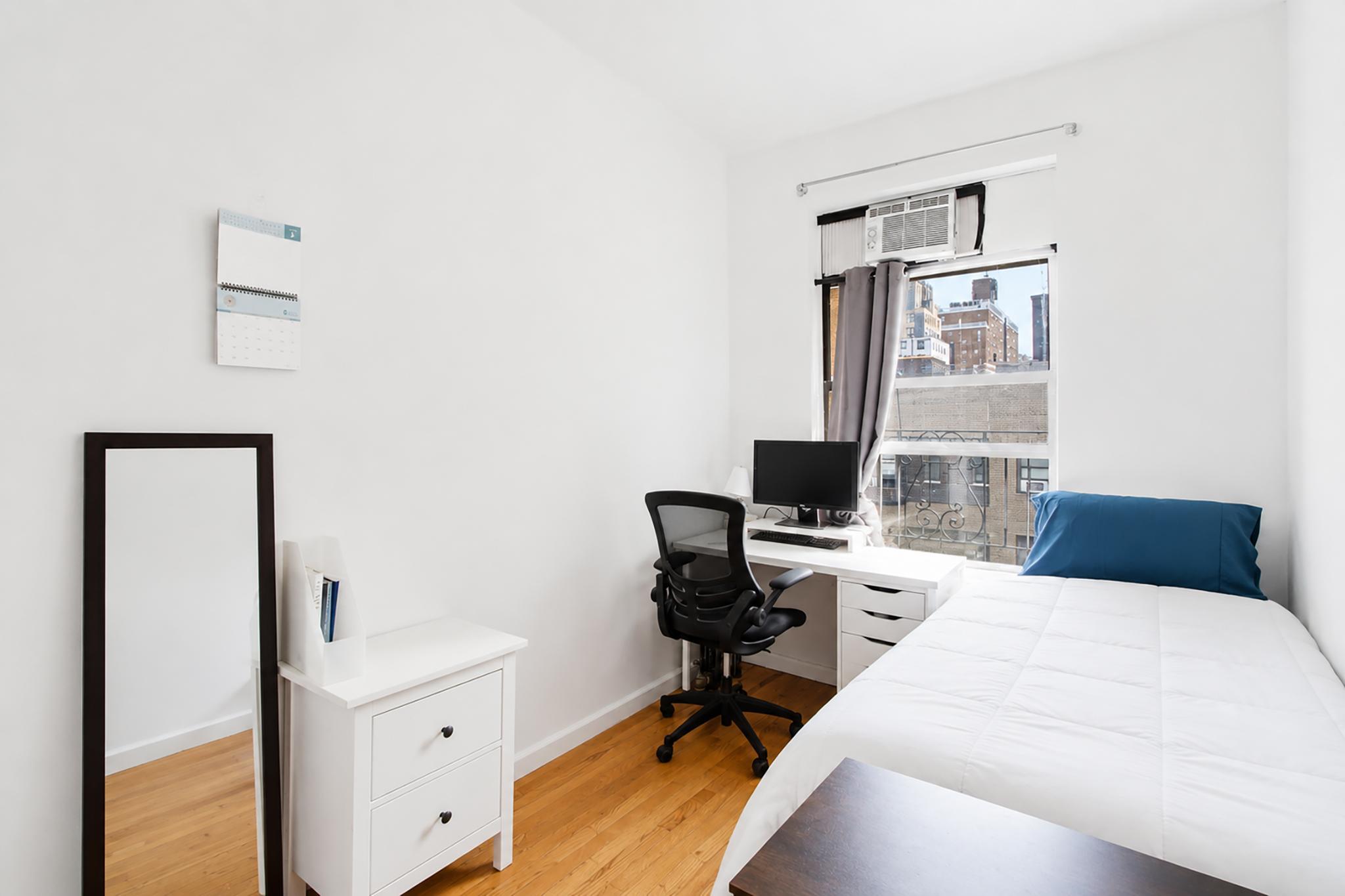205 West 103rd Street, Unit 6B Manhattan, NY 10025 - Photo 4 of 11 a view of a workspace with furniture