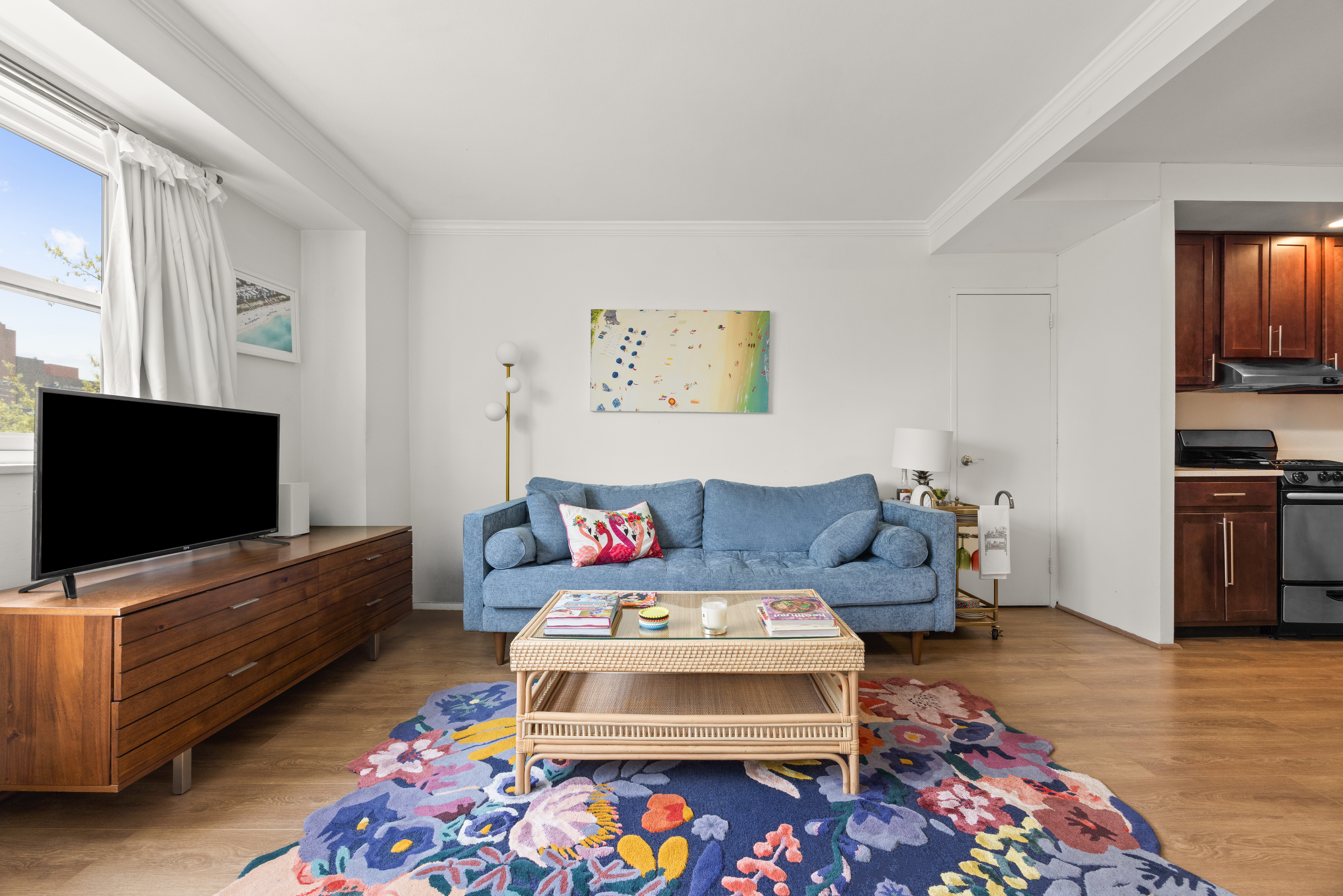 191 Willoughby Street, Unit 5E Brooklyn, NY 11201 - Photo 1 of 16 a living room with furniture and a flat screen tv