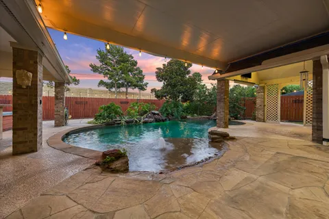 a view of a house with swimming pool