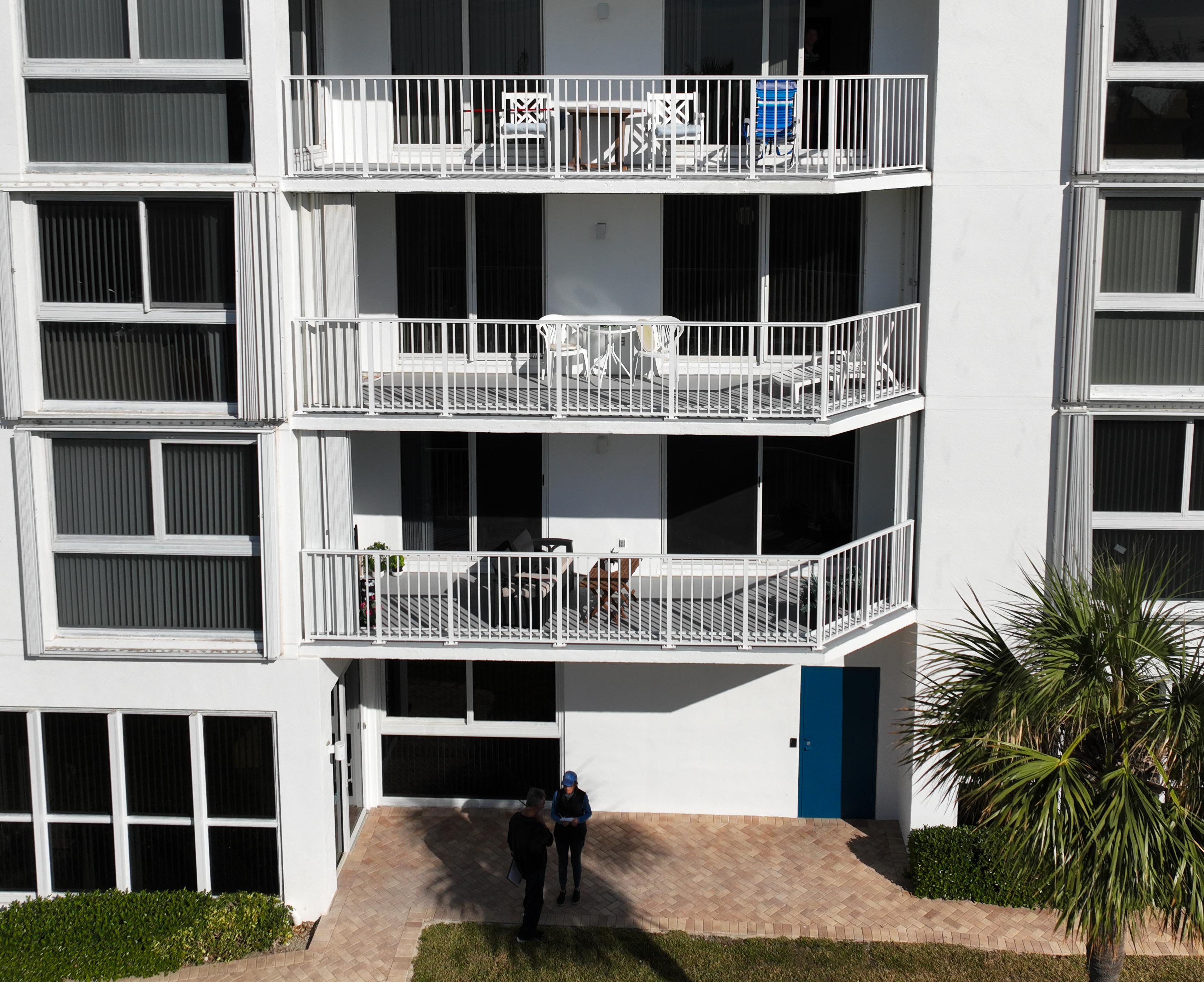 2700 North Highway A1a, Unit 207 Fort Pierce, FL 34949 - Photo 20 of 36 a front view of a building with many windows