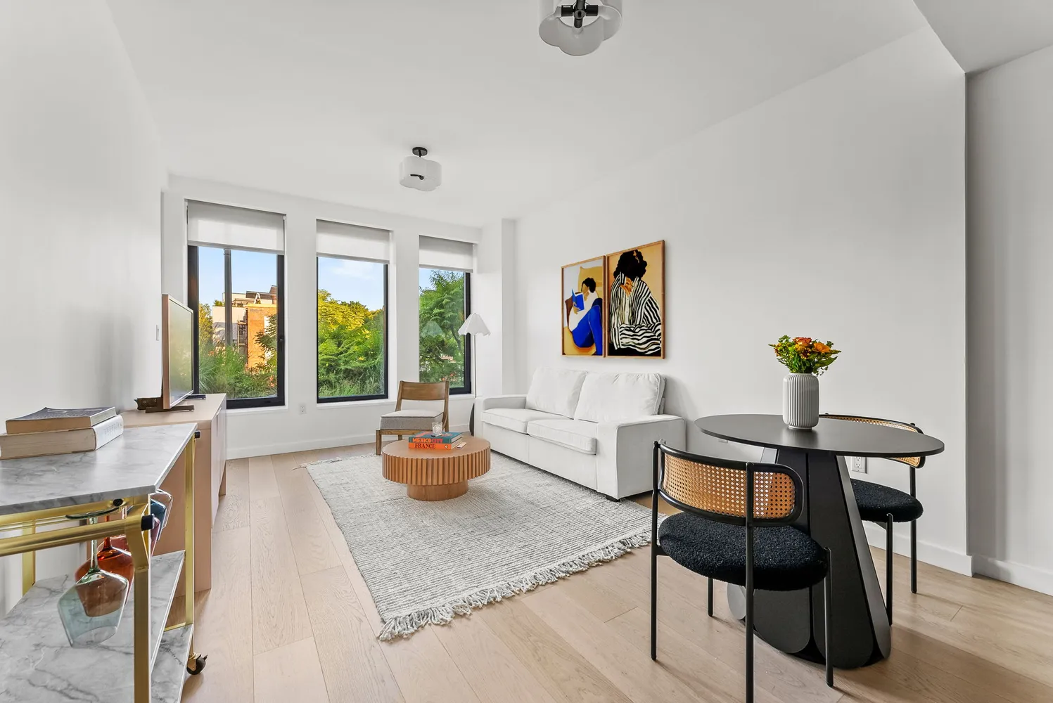 a living room with furniture and window