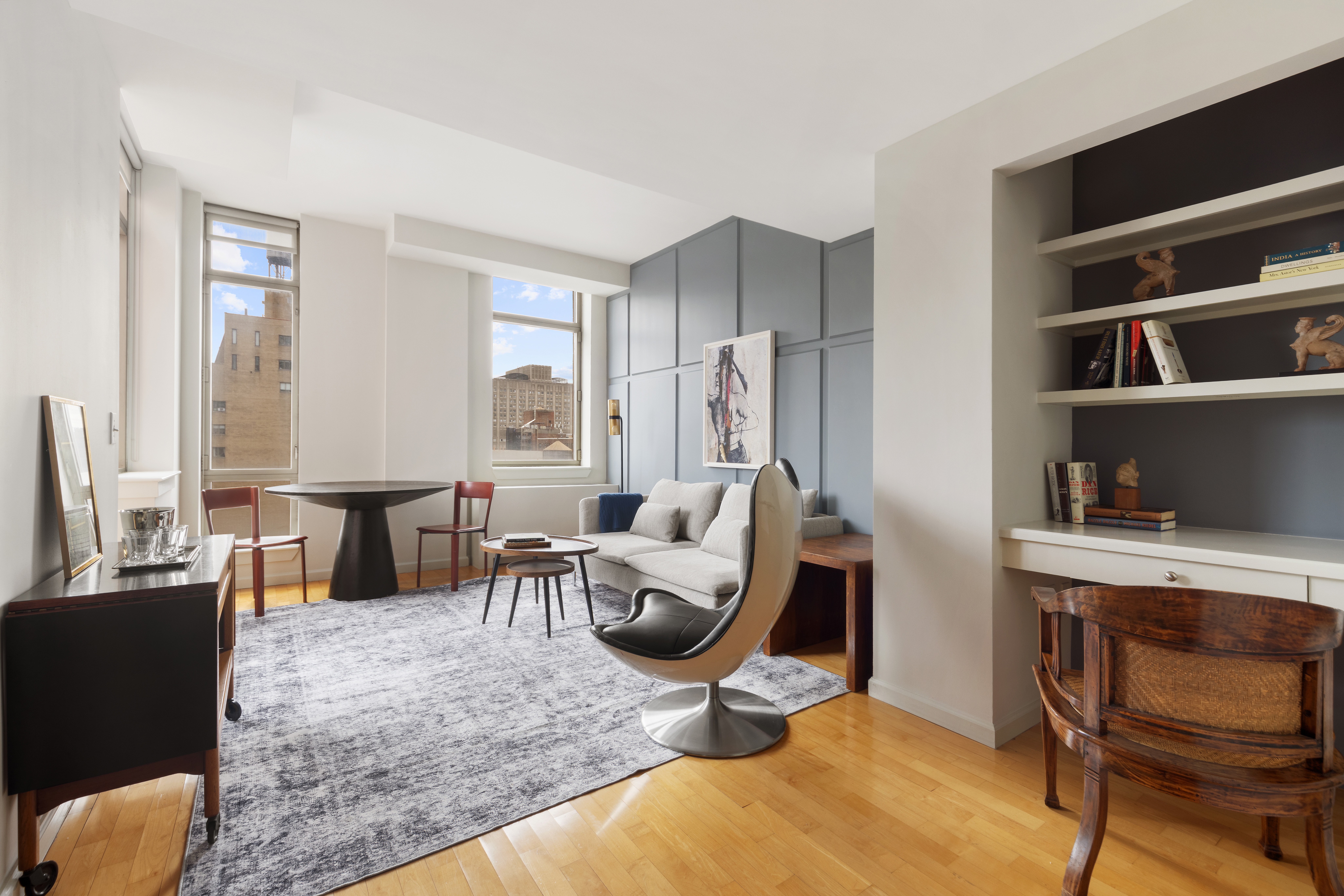 250 East 30th Street, Unit 14B Manhattan, NY 10016 - Photo 2 of 14 a living room with furniture window and a table