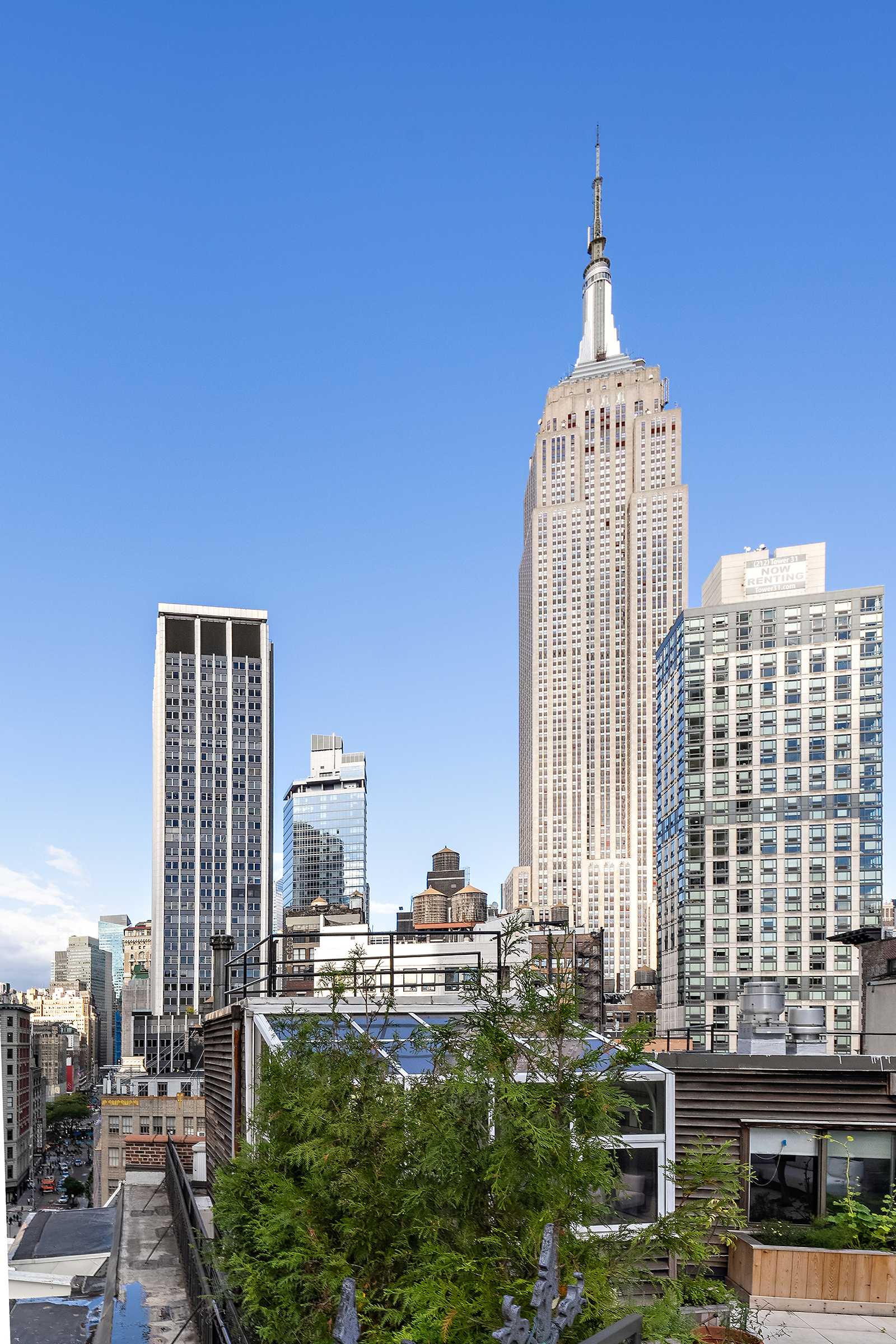 1200 Broadway, Unit PH89 Manhattan, NY 10001 - Photo 37 of 47 a view of a city with tall buildings