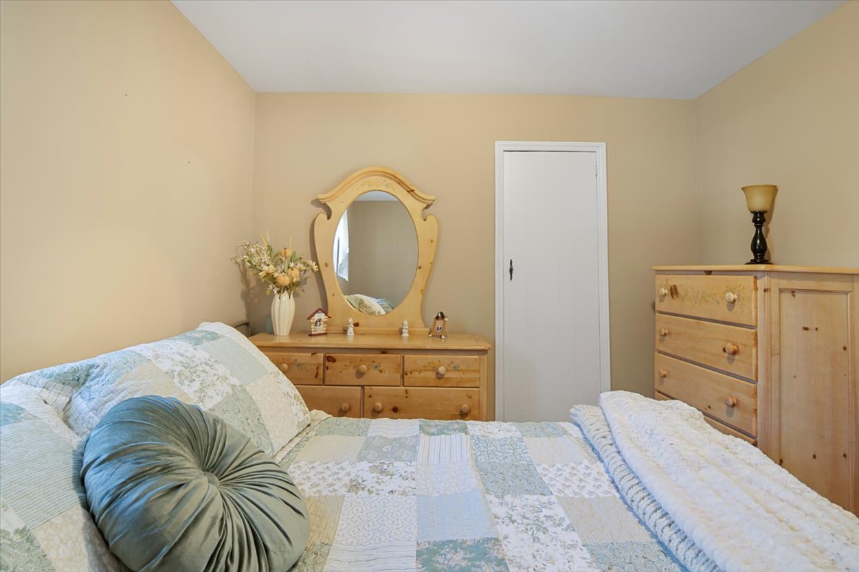 107 Kingston Road Parsippany, NJ 07054 - Photo 17 of 43 a bedroom with a bed and closet