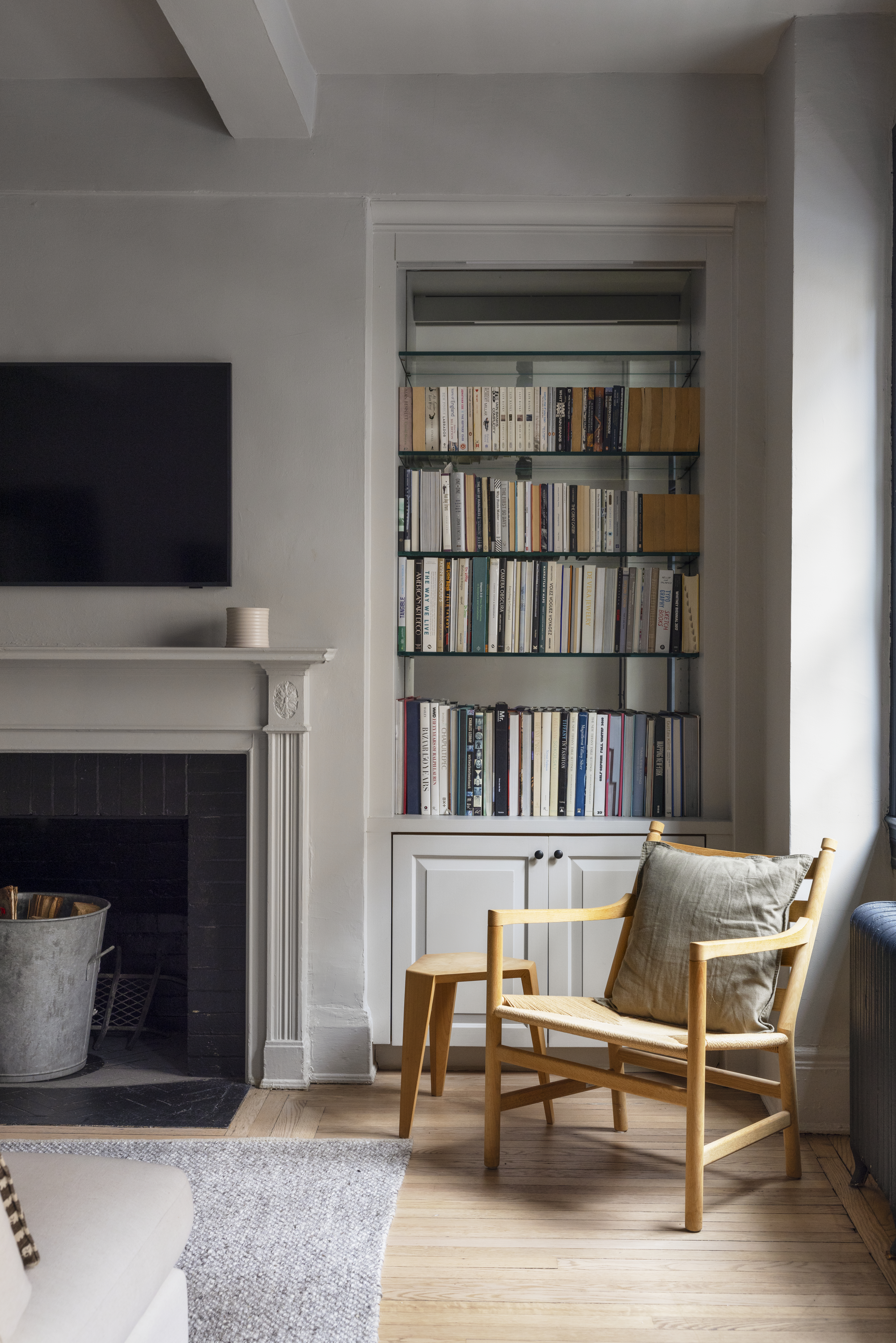 264 Lexington Avenue, Unit 3A Manhattan, NY 10016 - Photo 2 of 12 a living room with furniture and a fireplace