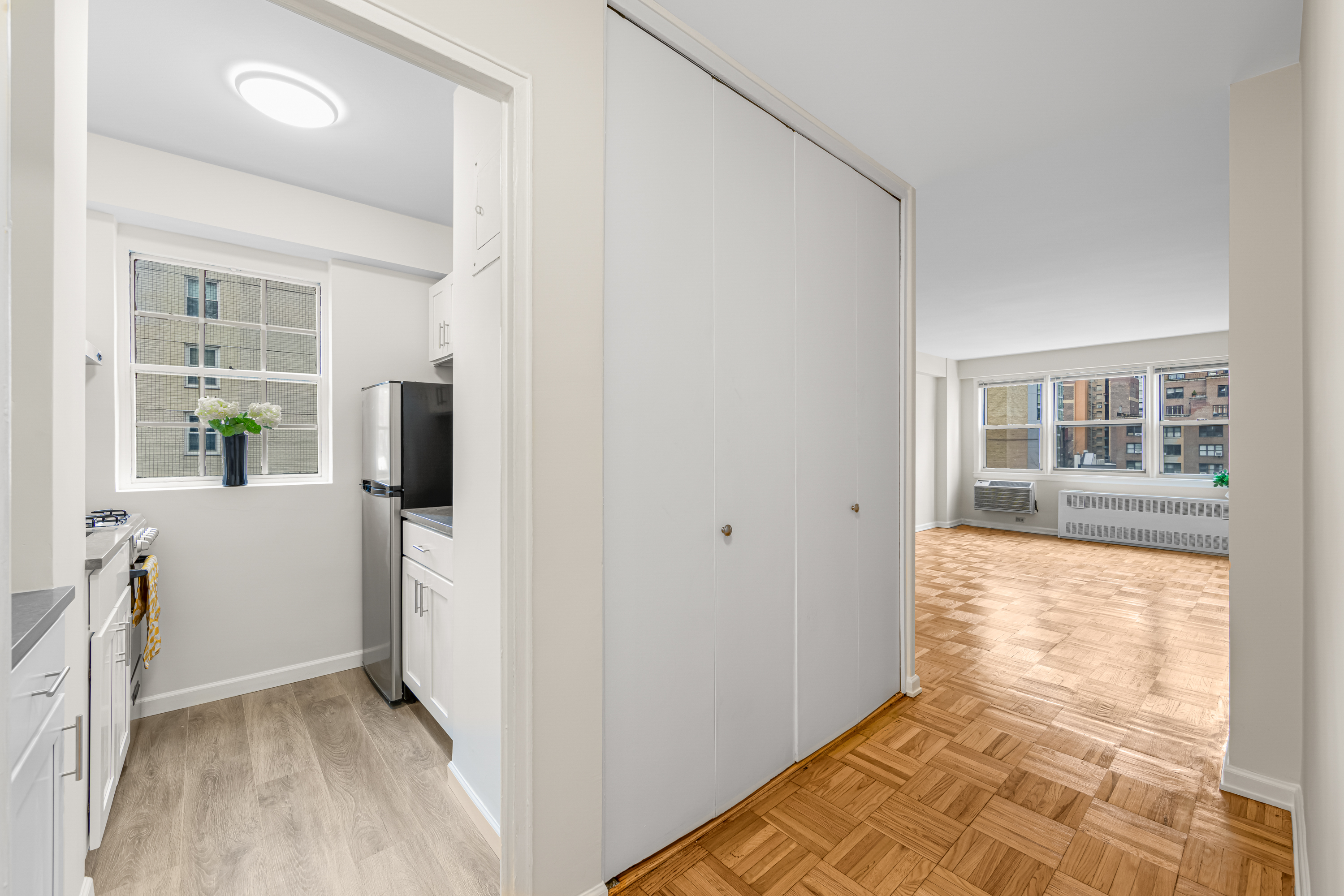 150 East 37th Street, Unit 10F Manhattan, NY 10016 - Photo 3 of 20 a view of an empty room with a window