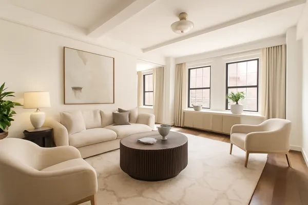 a living room with furniture and a window