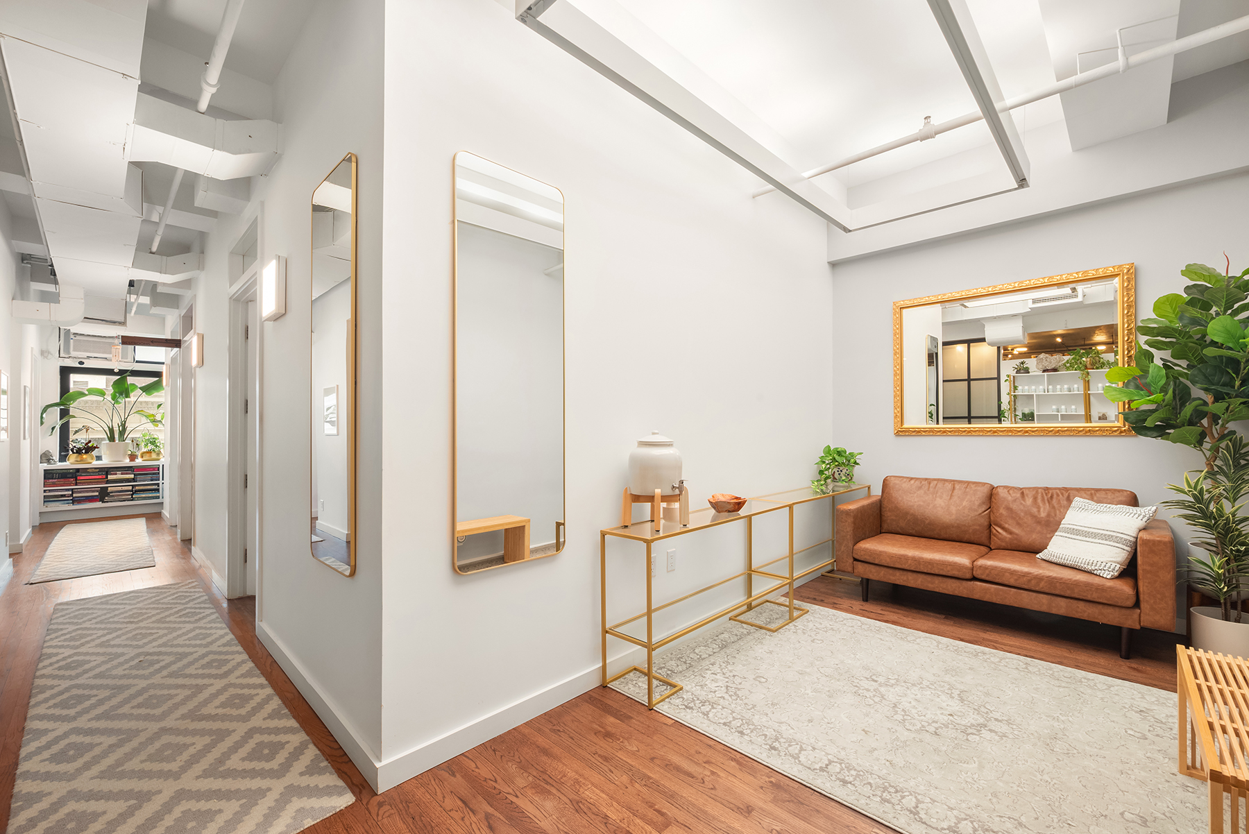 14 East 4th Street, Unit 604 Manhattan, NY 10012 - Photo 4 of 14 a living room with furniture and a rug