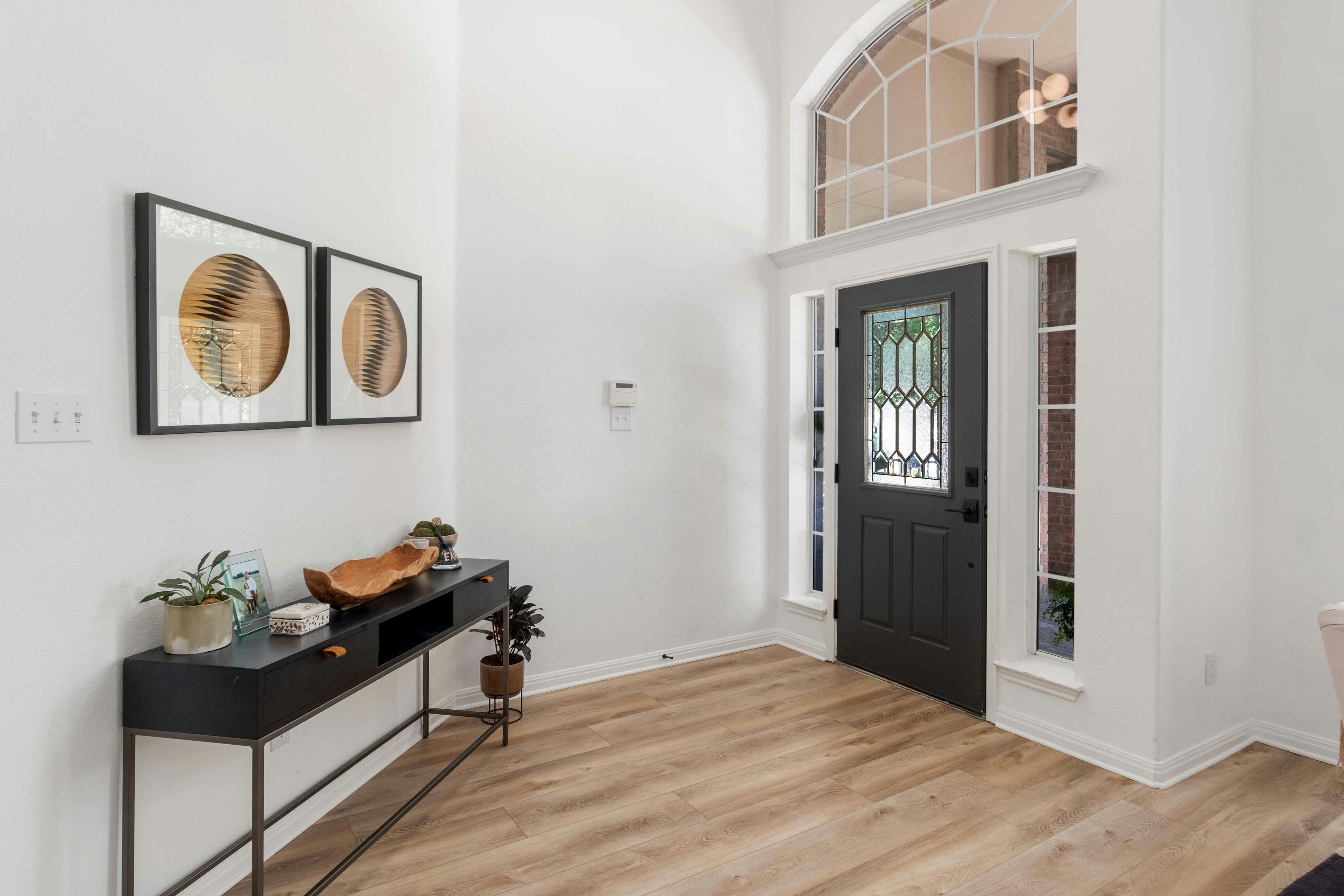 10608 Pointe View Drive Austin, TX 78738 - Photo 6 of 46 a bedroom with a bed and cabinets