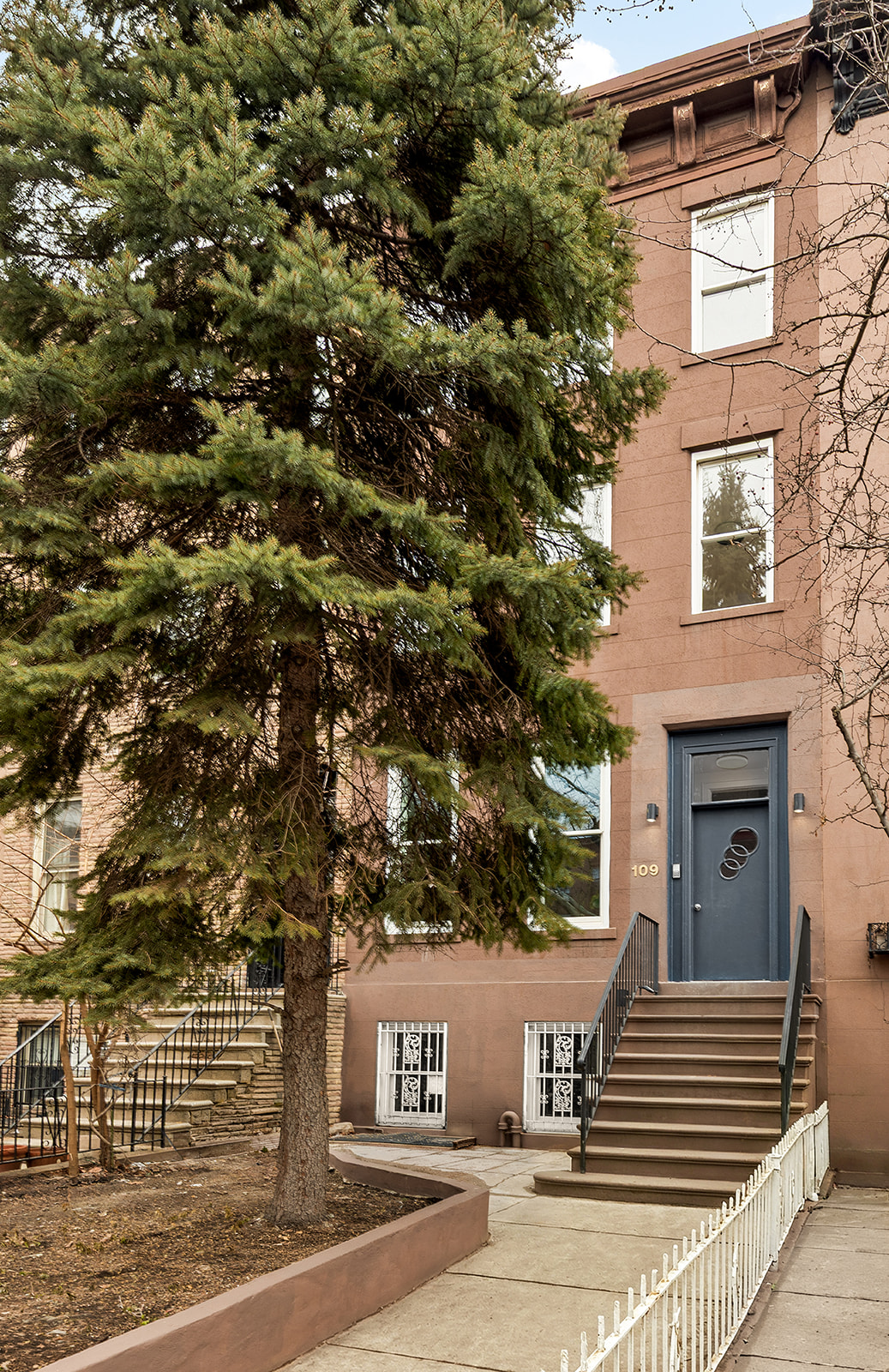 109 2nd Place Brooklyn, NY 11231 - Photo 25 of 26 front view of a house with a street