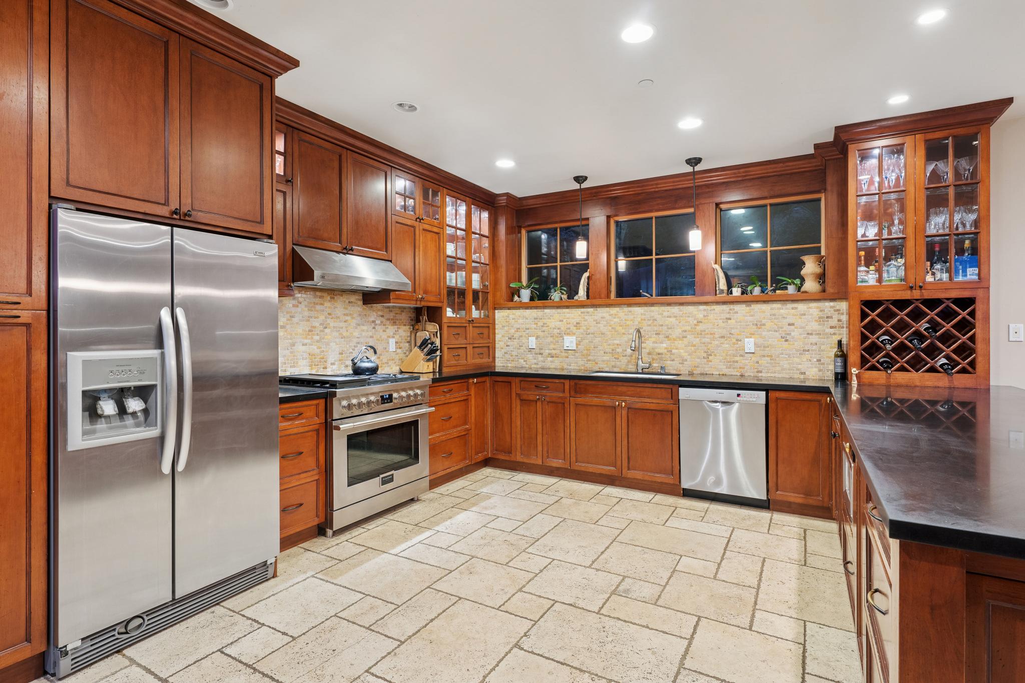 12 Chaparral Lane San Geronimo, CA 94963 - Photo 6 of 19 a kitchen with stainless steel appliances granite countertop a refrigerator and a stove