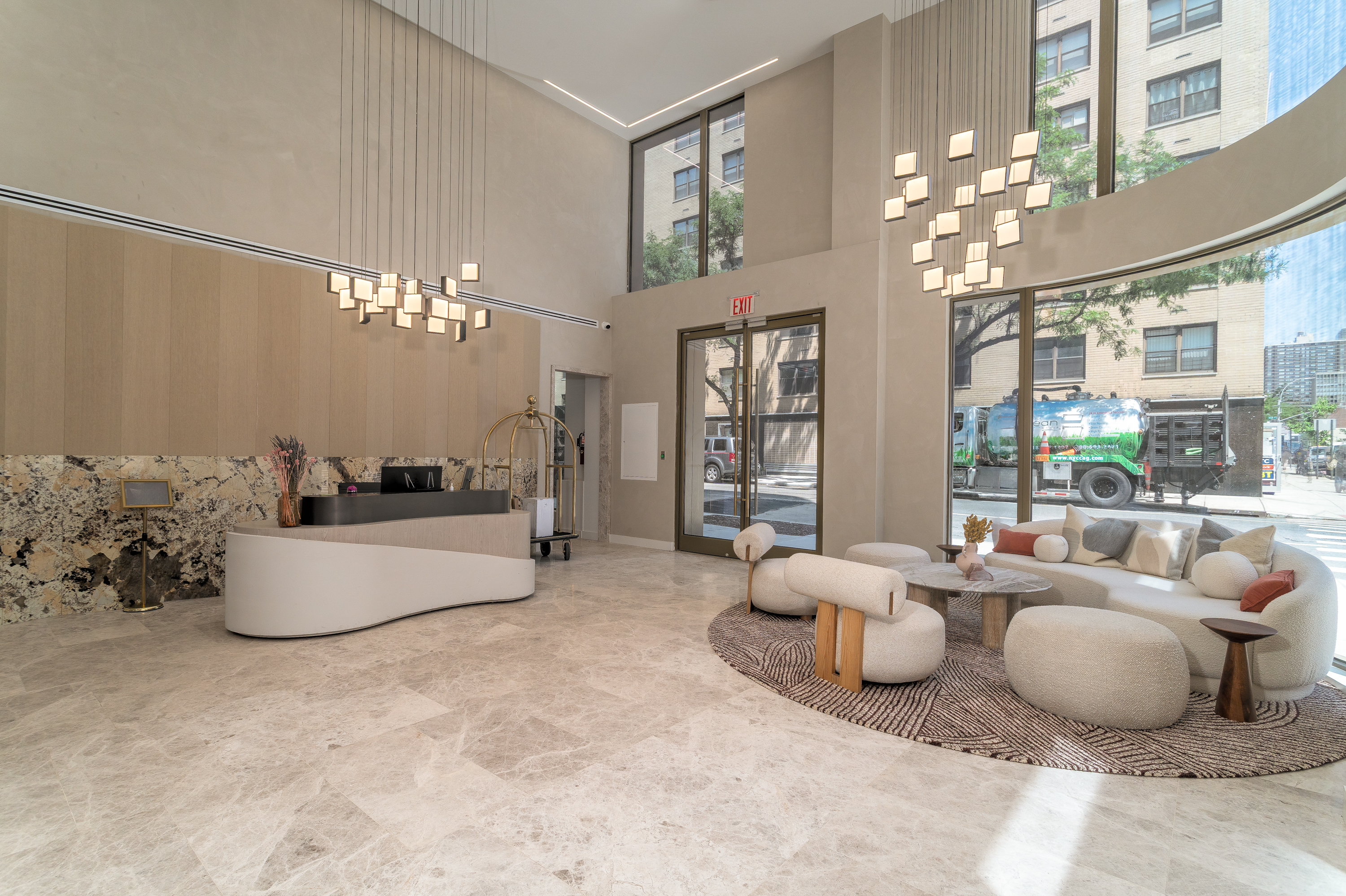 250 East 25th Street, Unit 4C Manhattan, NY 10010 - Photo 15 of 16 a living room with furniture and a large window or chandelier