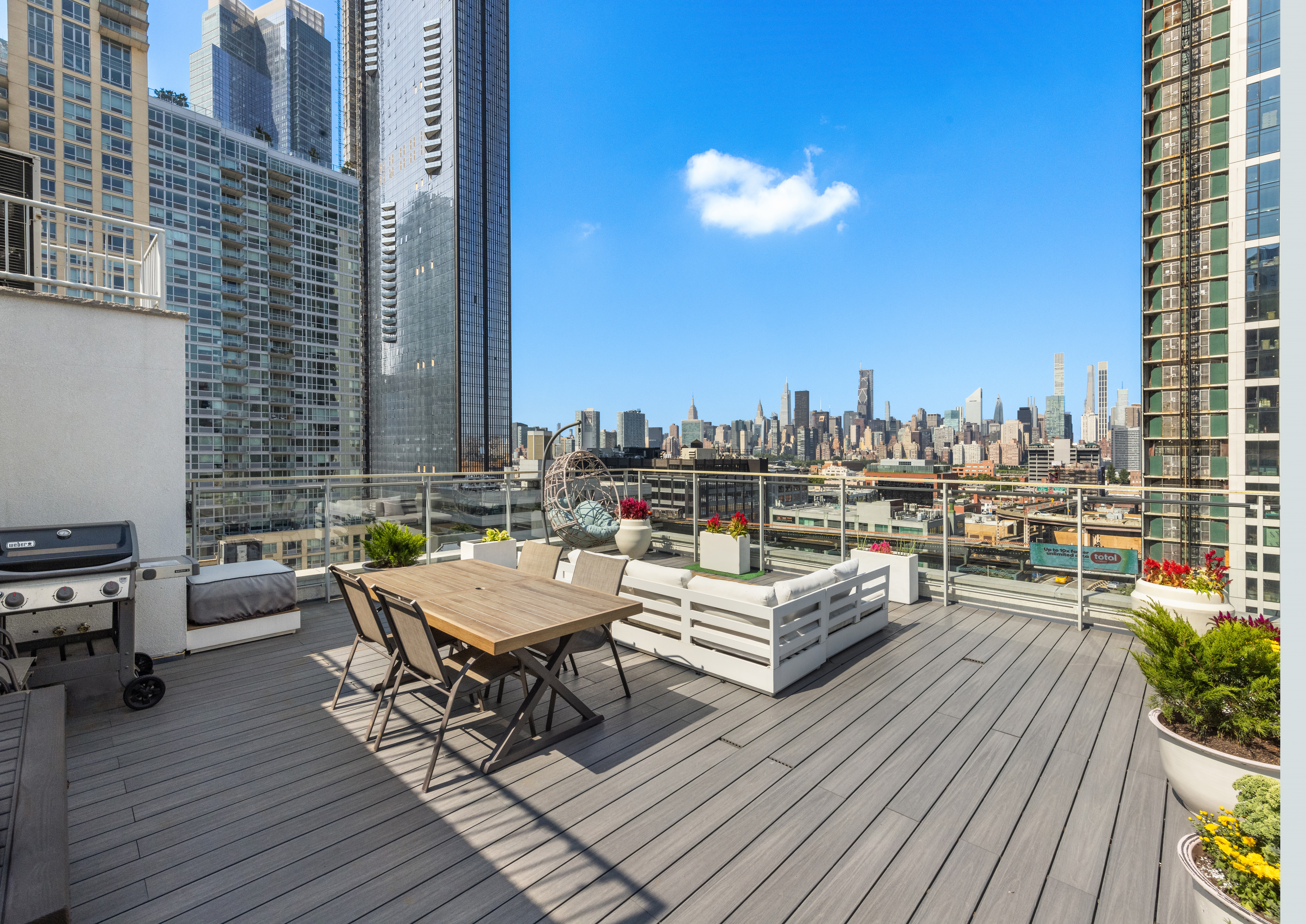 42-44 Crescent Street, Unit PHB Queens, NY 11101 - Photo 2 of 11 a view of roof deck with patio