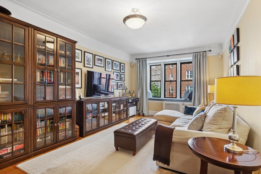 a living room with furniture and a window