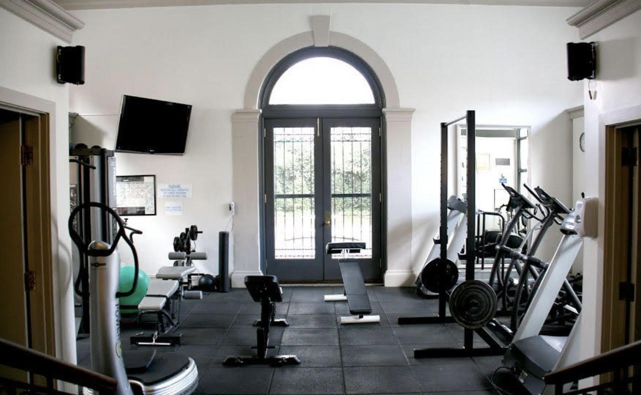 240 Centre Street, Unit 3H Manhattan, NY 10013 - Photo 19 of 20 a living room with furniture a flat screen tv and a large window