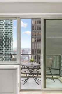 a view of a city with tall buildings