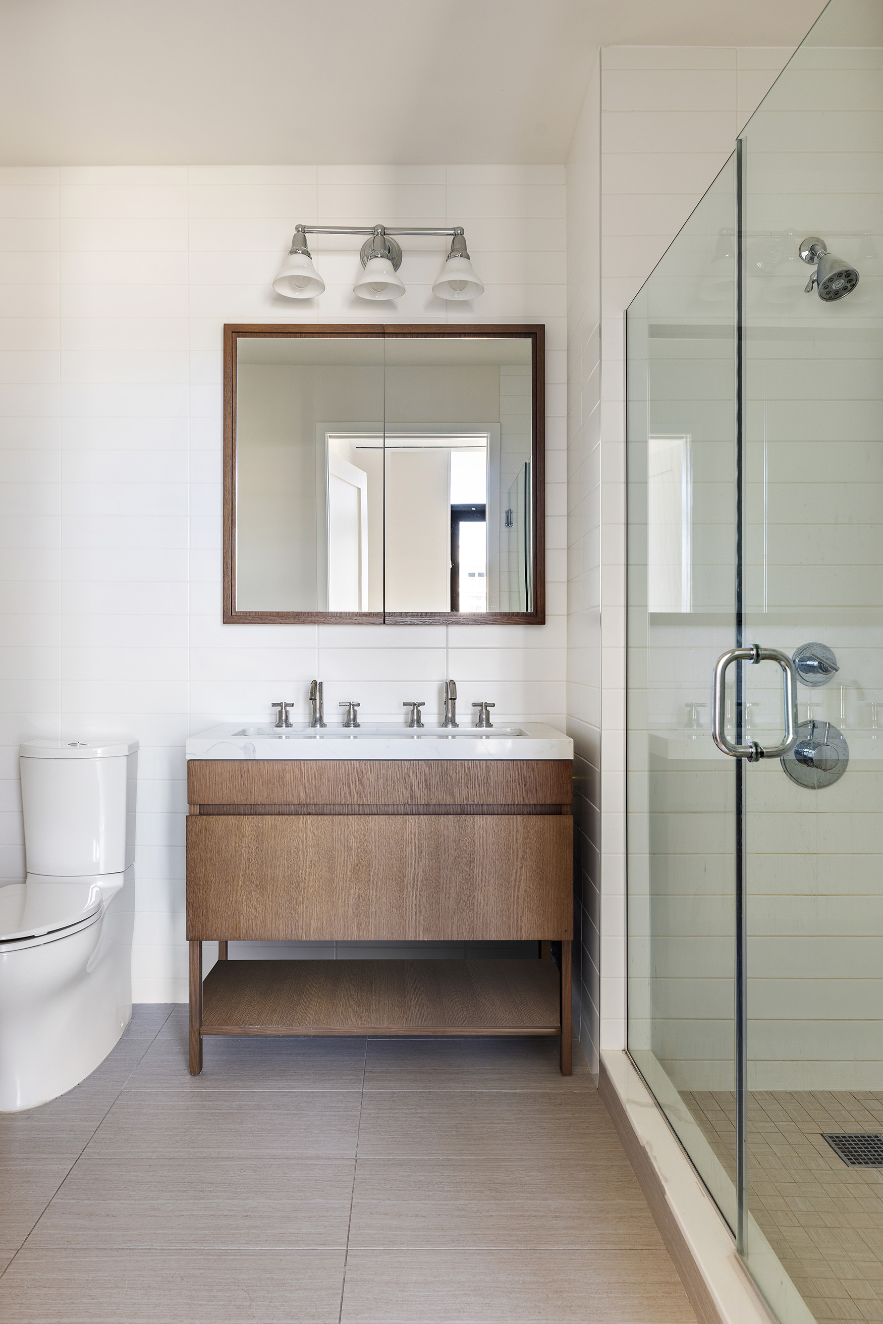 500 Waverly Avenue, Unit PH5 Brooklyn, NY 11238 - Photo 8 of 12 a bathroom with a sink and a mirror
