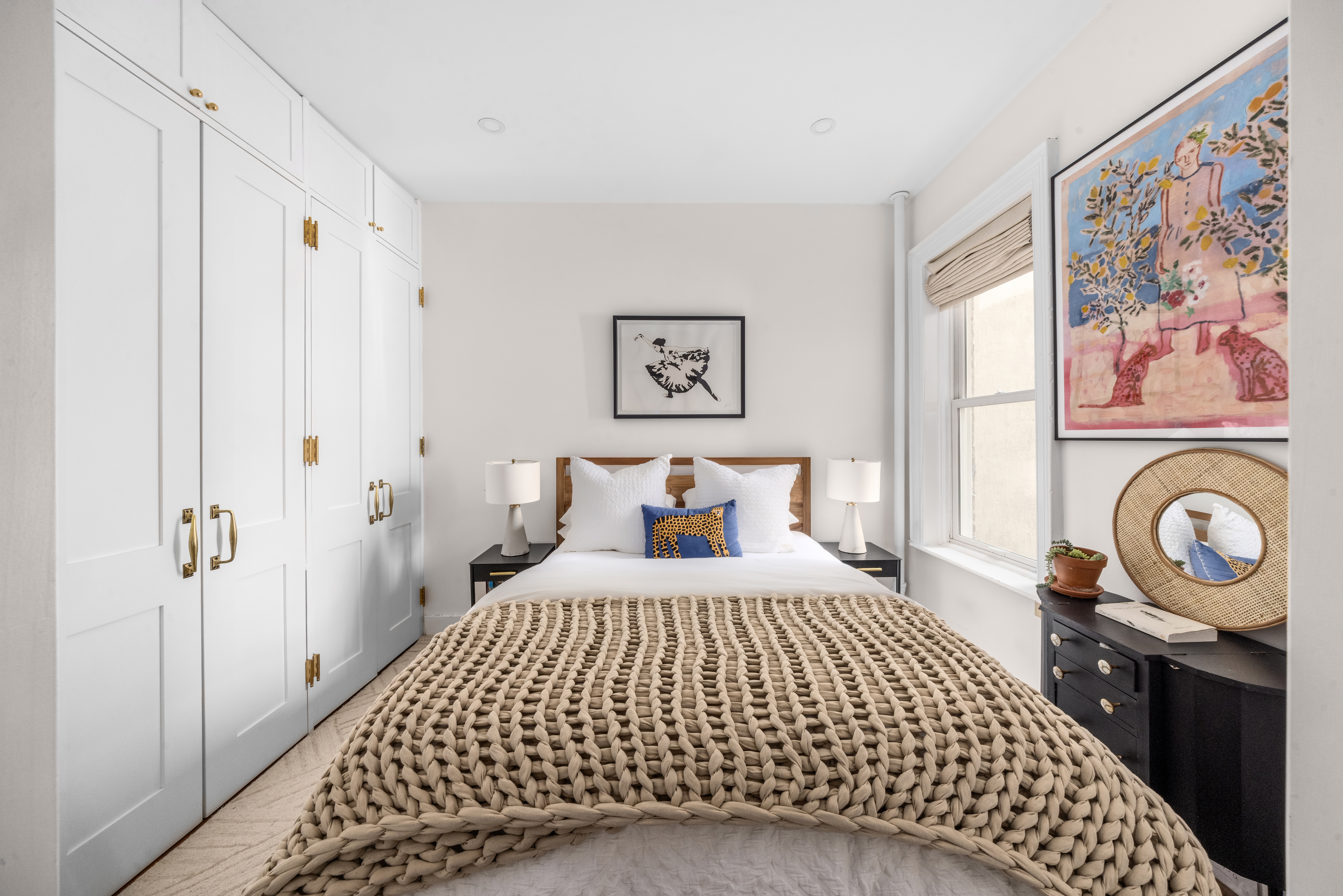 237 West 11th Street, Unit 2B Manhattan, NY 10014 - Photo 8 of 13 a bedroom with a bed and a window