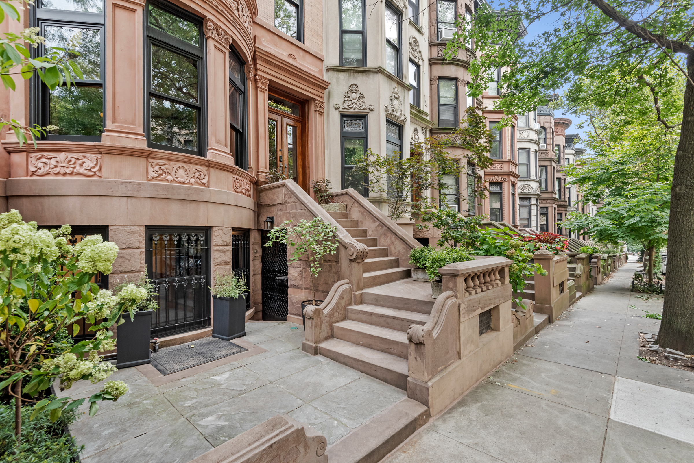 616 2nd Street Brooklyn, NY 11215 - Photo 17 of 19 a front view of a building with garden