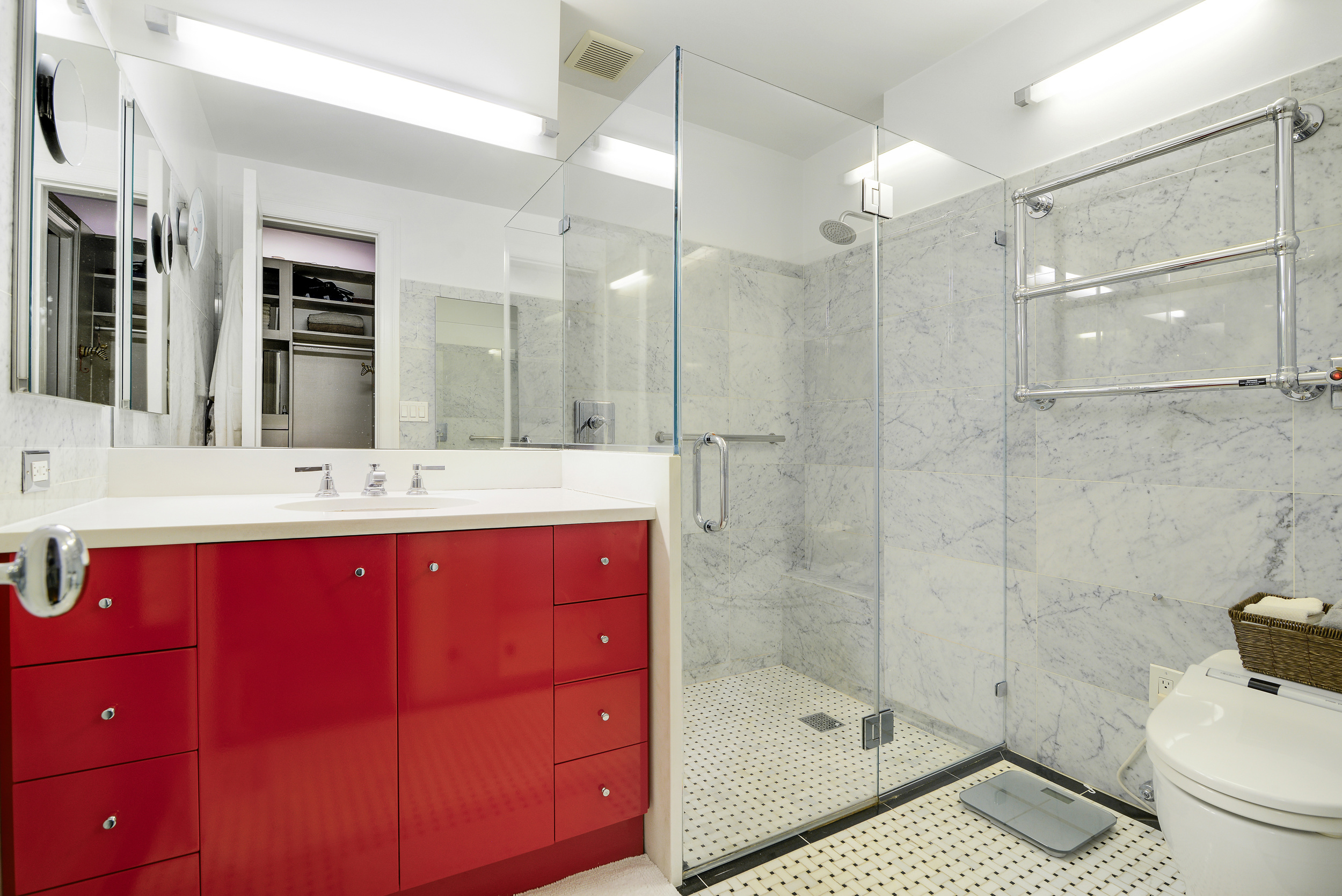 20 West 72nd Street, Unit 601 Manhattan, NY 10023 - Photo 13 of 21 a bathroom with a sink a toilet and shower