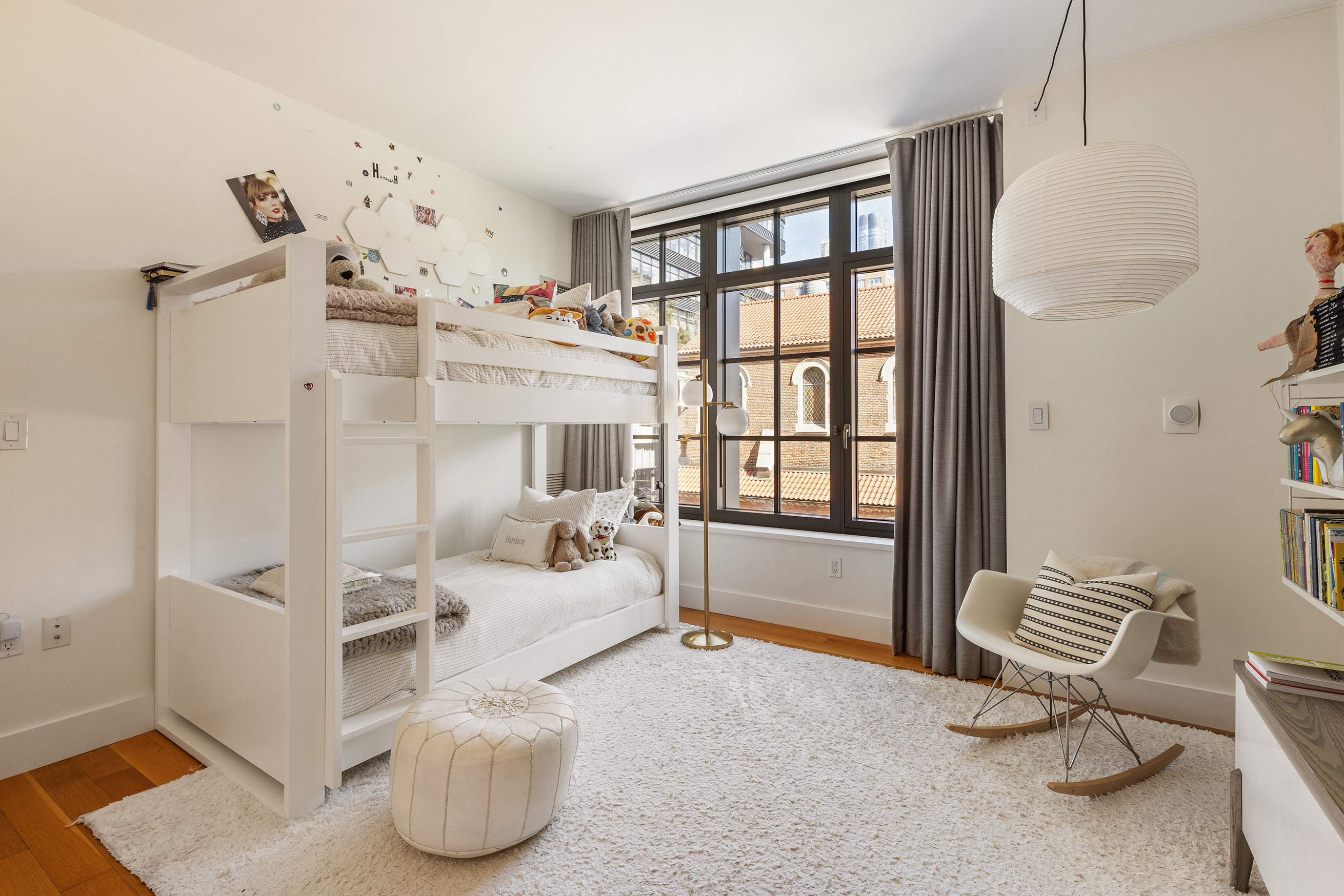 500 West 21st Street, Unit 3A Manhattan, NY 10011 - Photo 9 of 11 a living room with furniture and a window