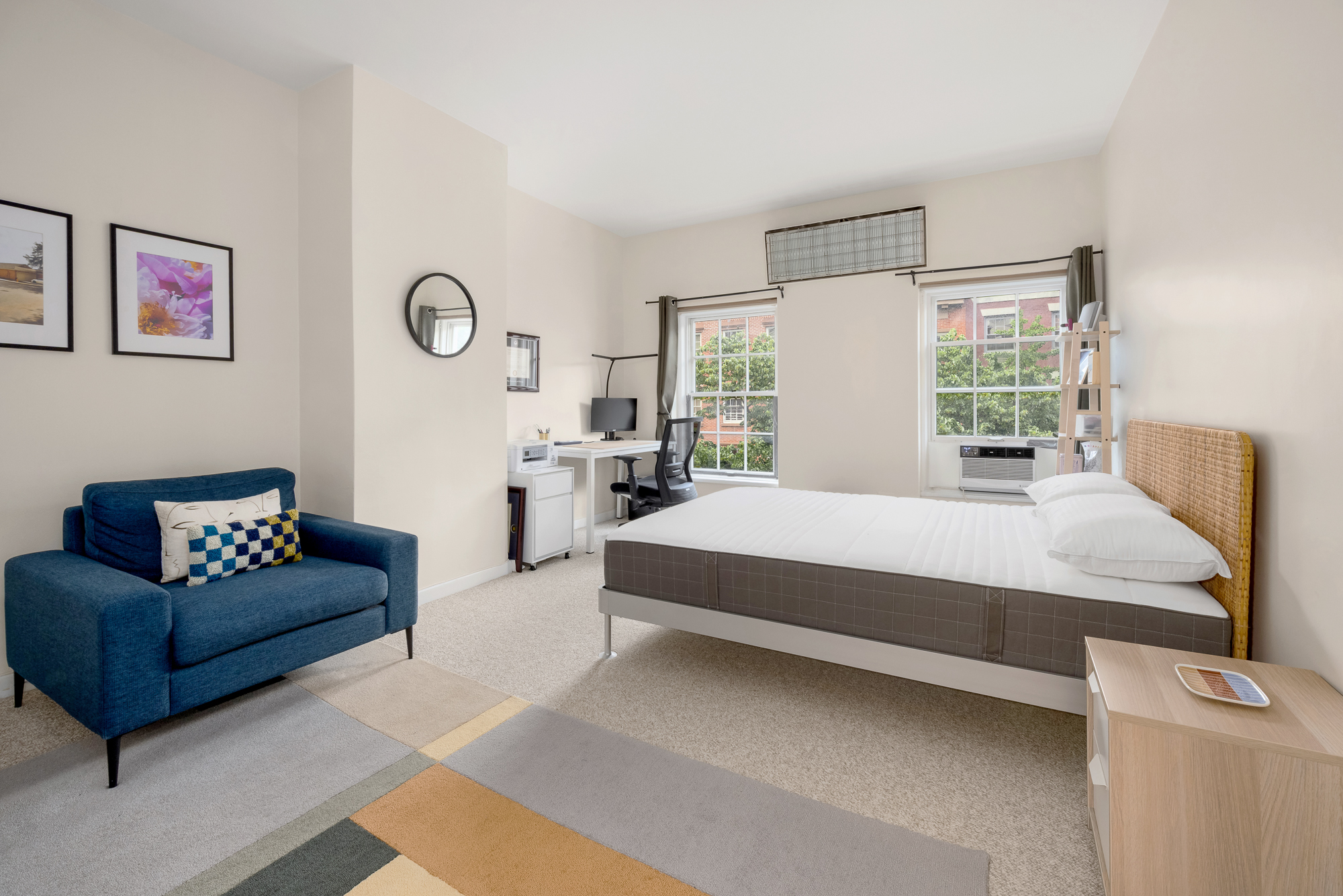 342 West 22nd Street, Unit 3 Manhattan, NY 10011 - Photo 7 of 11 a spacious bedroom with a bed couch and window