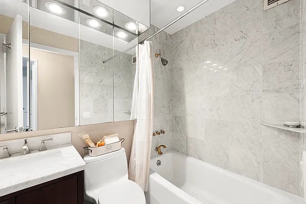 250 West 90th Street, Unit PH1E Manhattan, NY 10024 - Photo 6 of 13 a bathroom with a sink toilet tub and shower