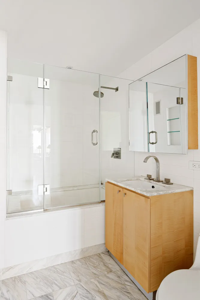 a bathroom with a bathtub and a sink