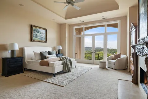 a bedroom with a bed and a couch