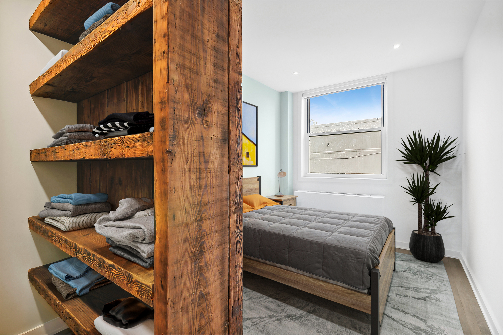 350 West 14th Street, Unit PHB Manhattan, NY 10014 - Photo 5 of 15 a bedroom with a bed and a potted plant