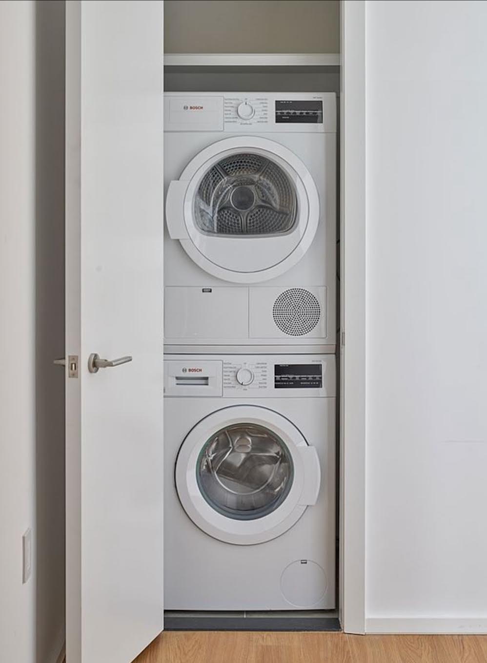 5 South 5th Street, Unit 308 Brooklyn, NY 11249 - Photo 5 of 13 a utility room with dryer and washer