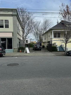 a front view of a building with street view