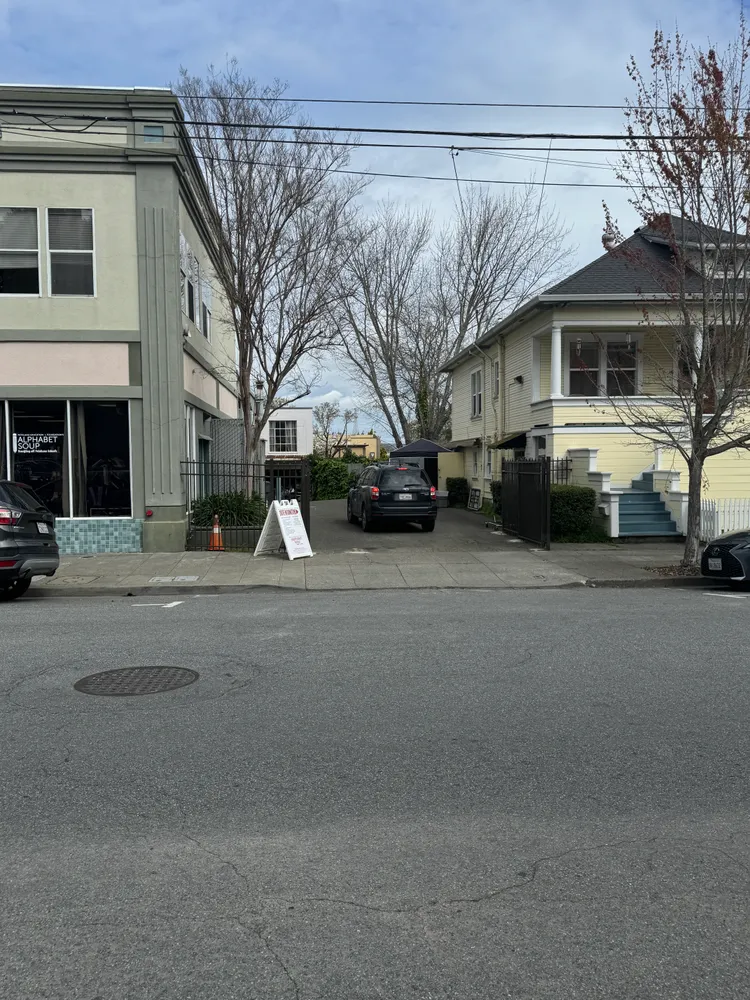 a front view of a building with street view