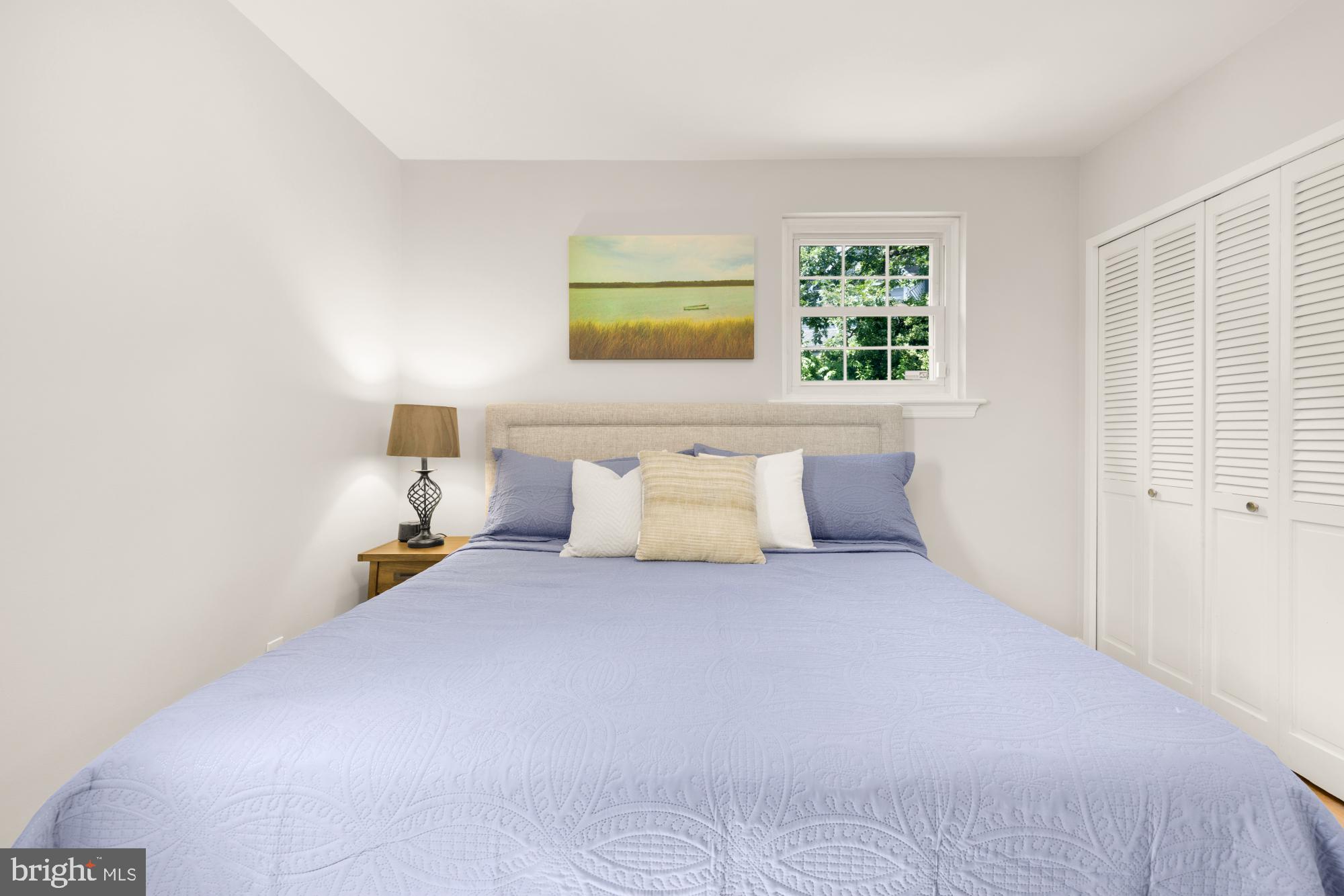 2611 Ross Road Chevy Chase, MD 20815 - Photo 18 of 37 a bedroom with a bed and a window