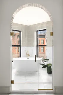 a kitchen with a sink and a window