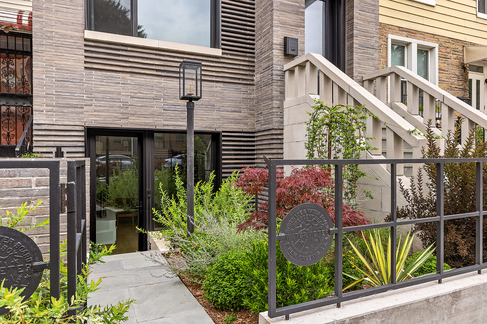 155 14th Street, Unit B Brooklyn, NY 11215 - Photo 5 of 6 a front view of a house with a garden