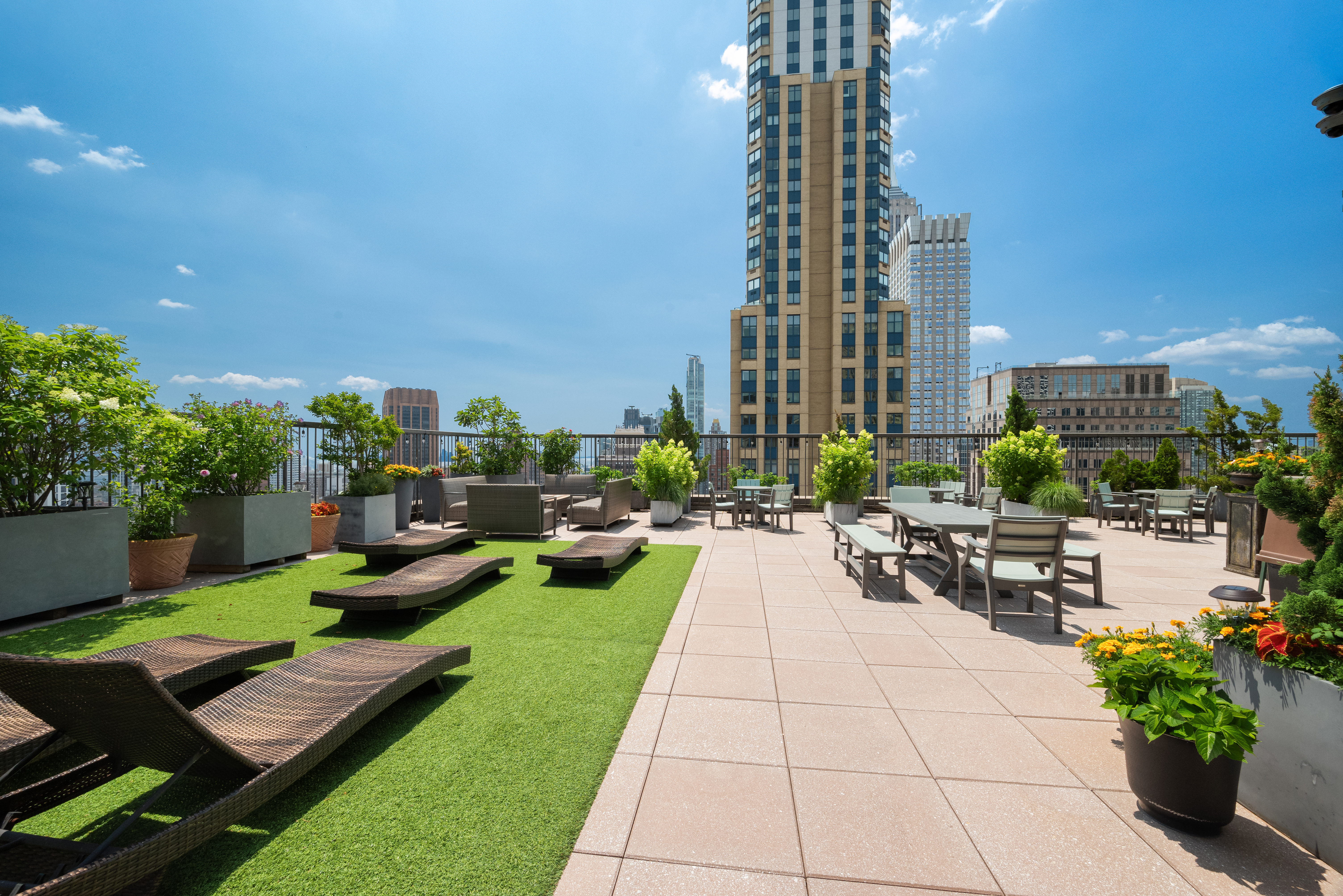 445 5th Avenue, Unit 26C Manhattan, NY 10016 - Photo 9 of 11 a view of swimming pool with outdoor seating and plants