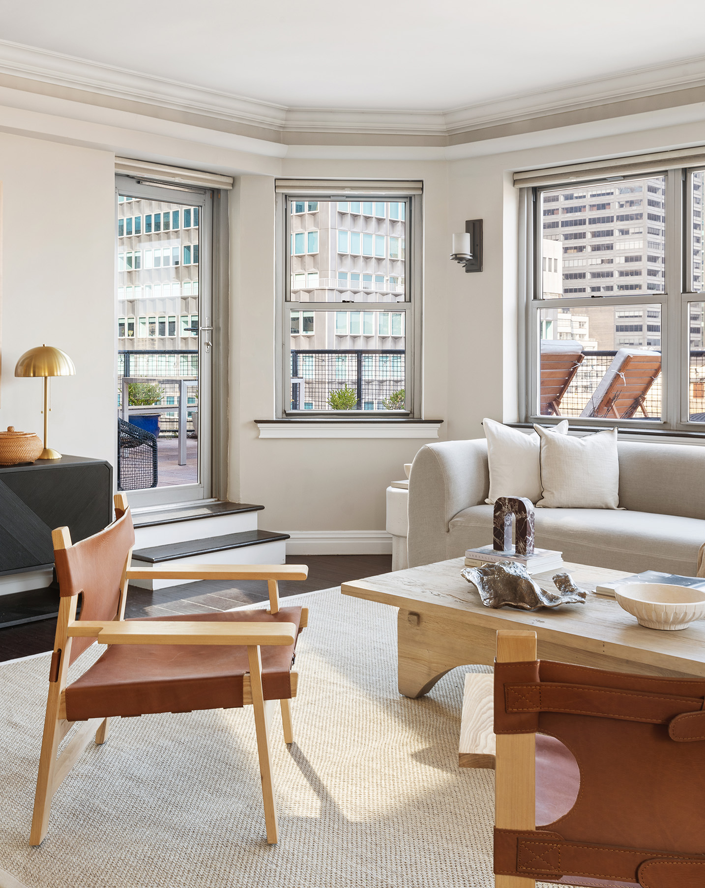 80 Park Avenue, Unit 19N Manhattan, NY 10016 - Photo 9 of 20 a living room with furniture and a large window