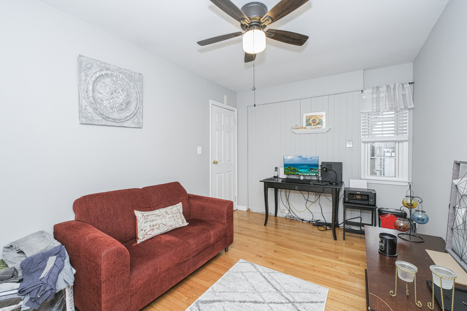 503 Falcon Avenue Staten Island, NY 10306 - Photo 18 of 30 a living room with furniture and a wooden floor