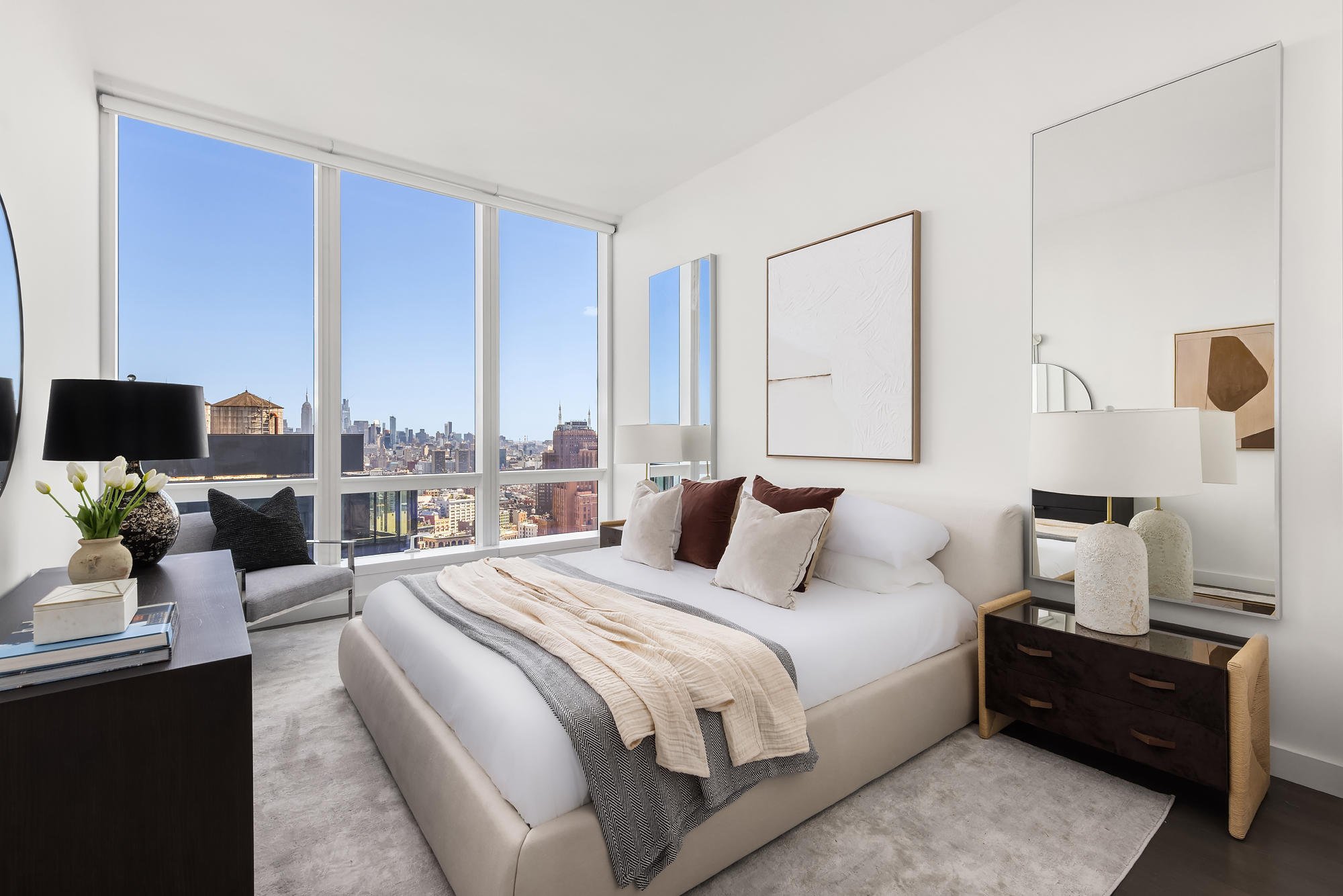 111 Murray Street, Unit 38A Manhattan, NY 10007 - Photo 10 of 29 a large bedroom with a bed and large window