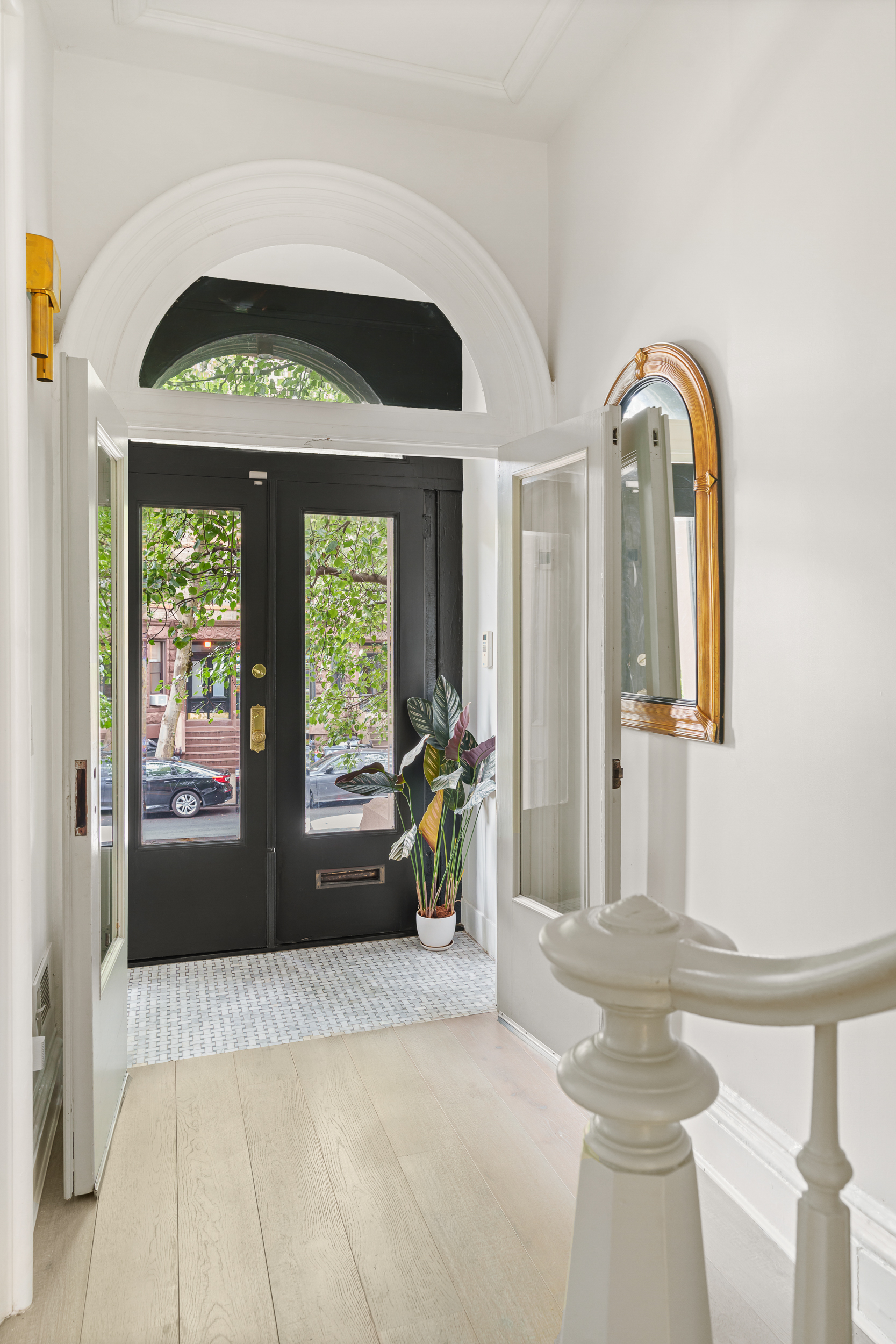 265 6th Avenue Brooklyn, NY 11215 - Photo 5 of 24 a living room with a bed and a large window