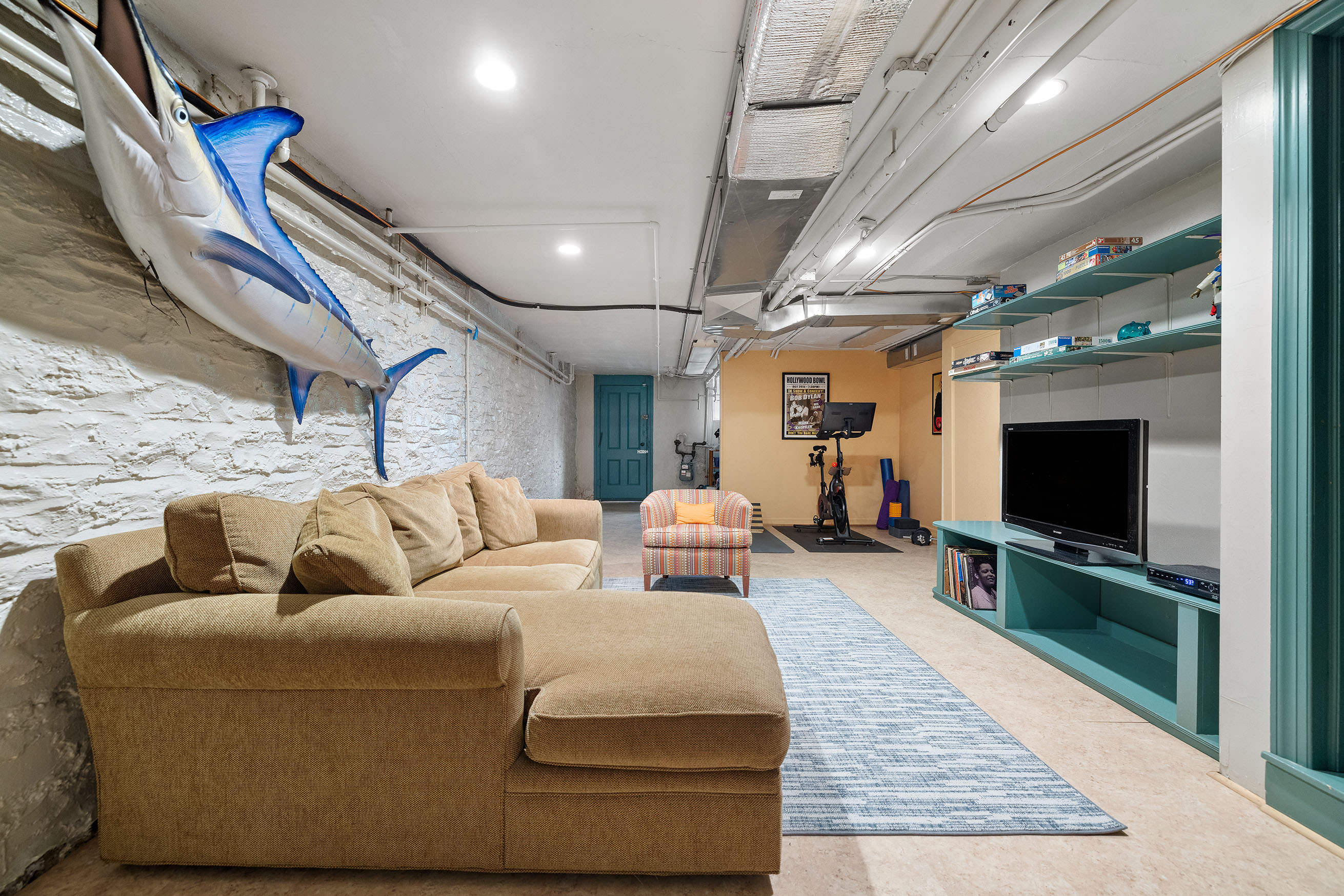 577 4th Street Brooklyn, NY 11215 - Photo 20 of 22 a living room with furniture and a flat screen tv